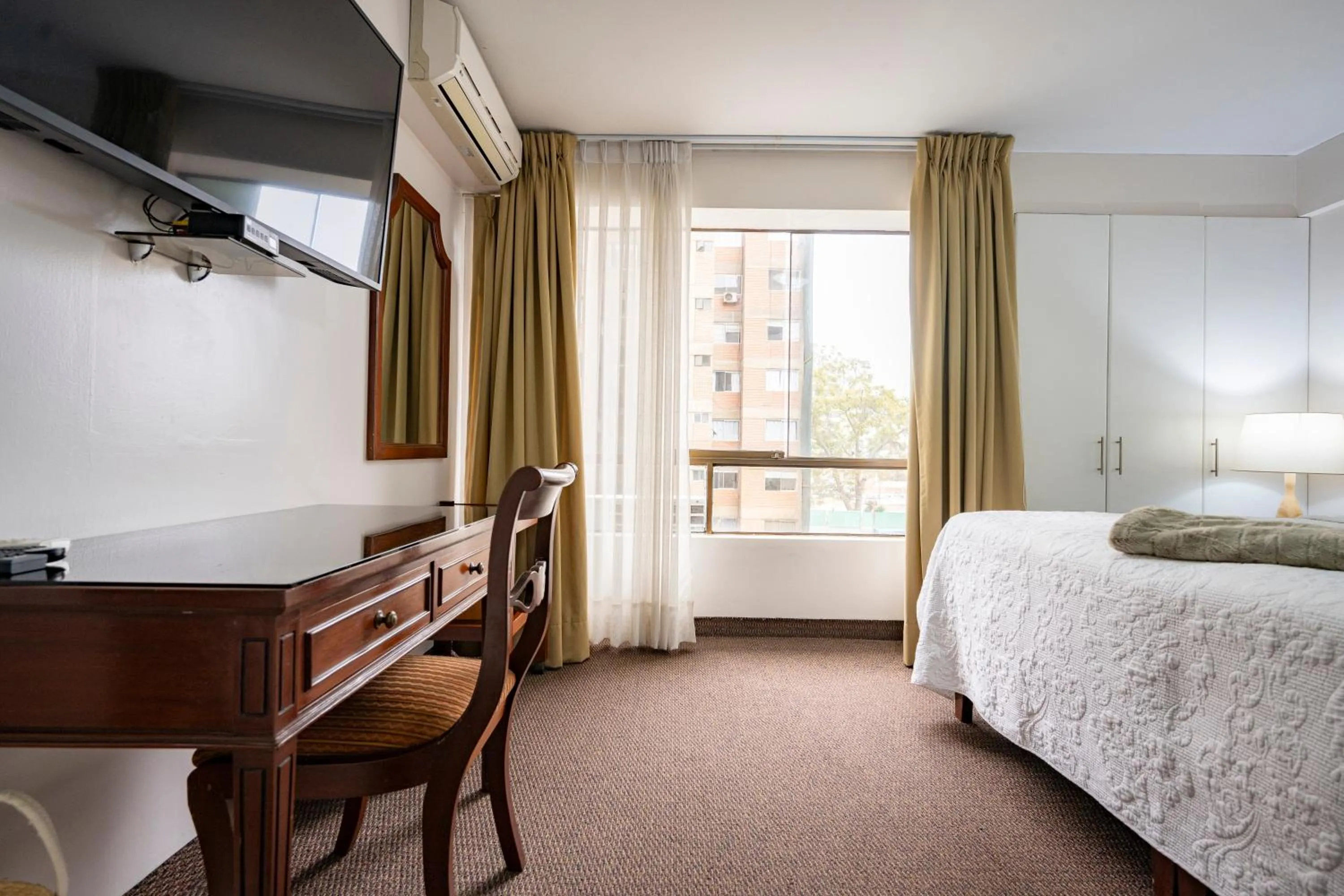 Bed in Apart Hotel San Martin