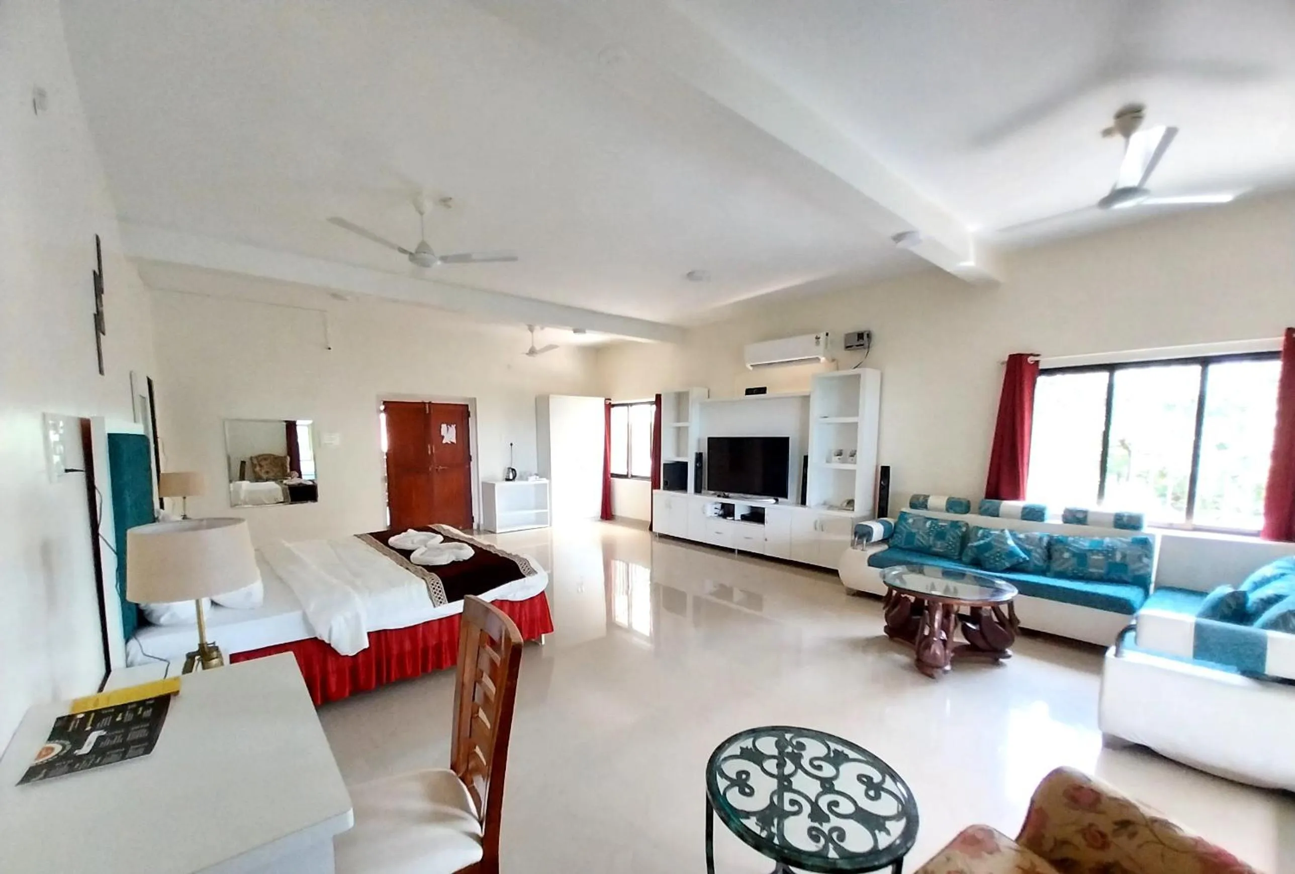 Bed in Mango Valley Resort Ganpatipule