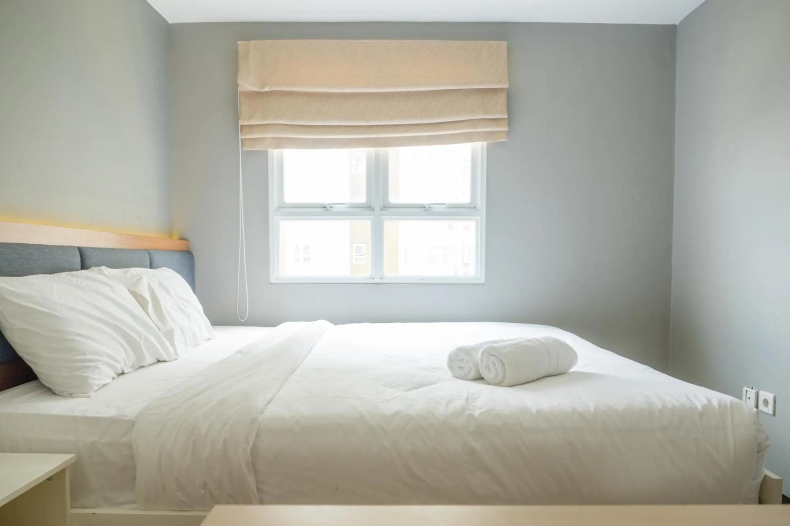 Bedroom, Bed in Pleasant 2BR Apartment at Gateway Pasteur By Travelio