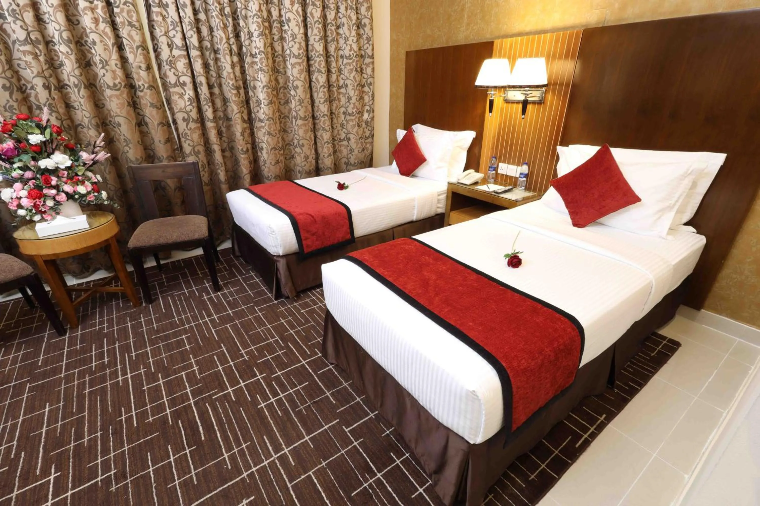 Bed in City Tower Hotel