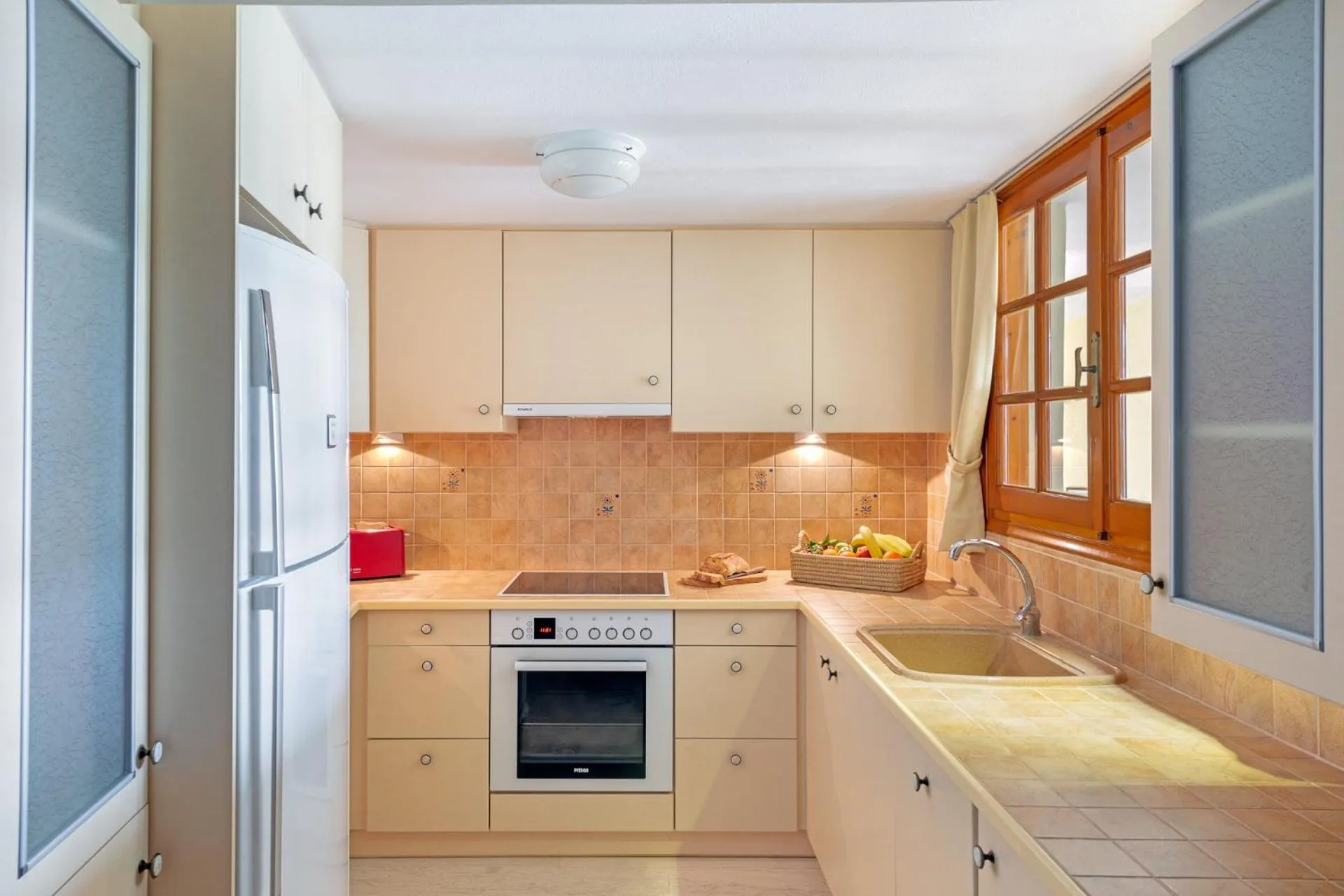 Kitchen or kitchenette in Europe Hotel