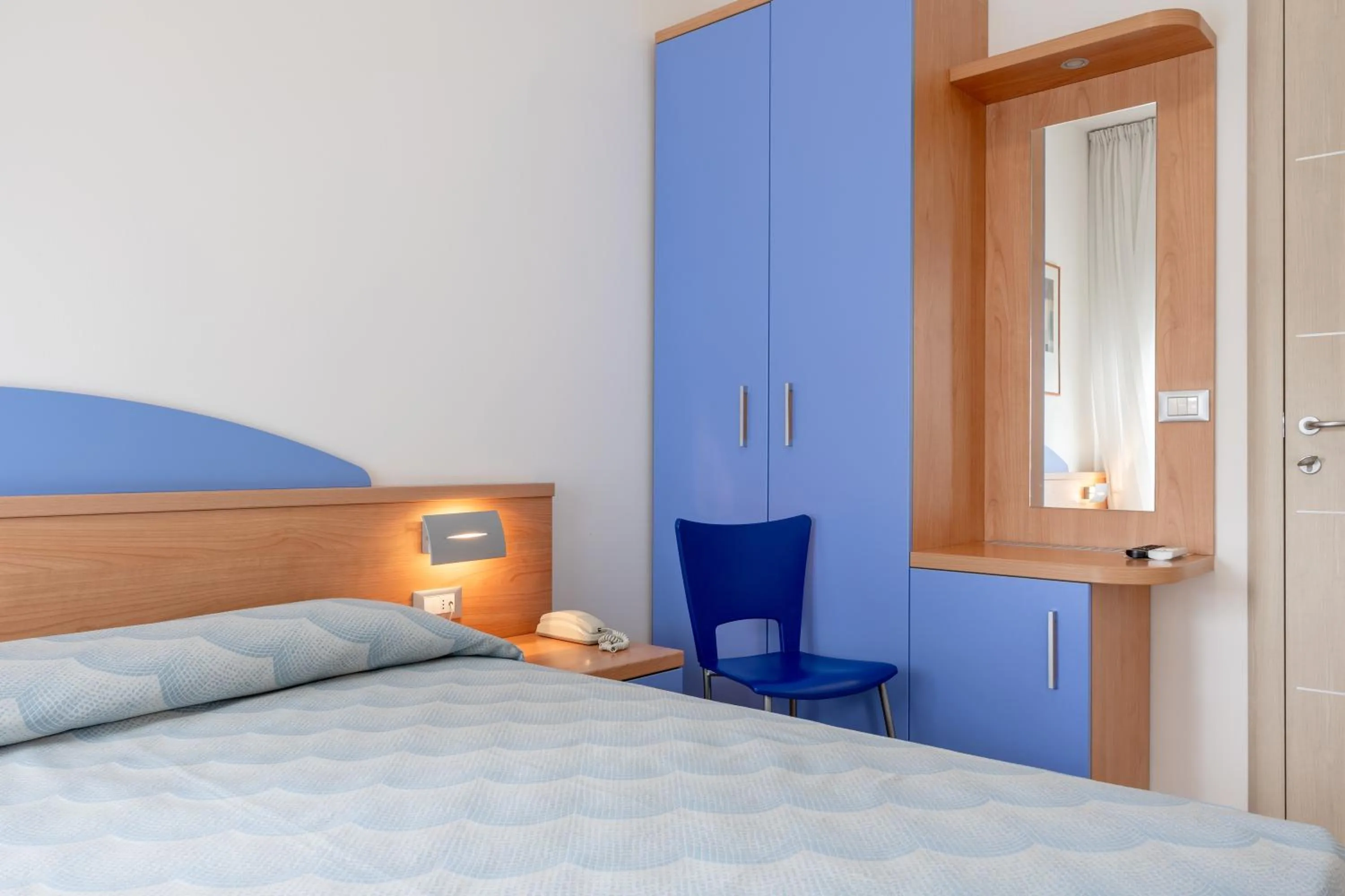 Bed in Hotel Riviera