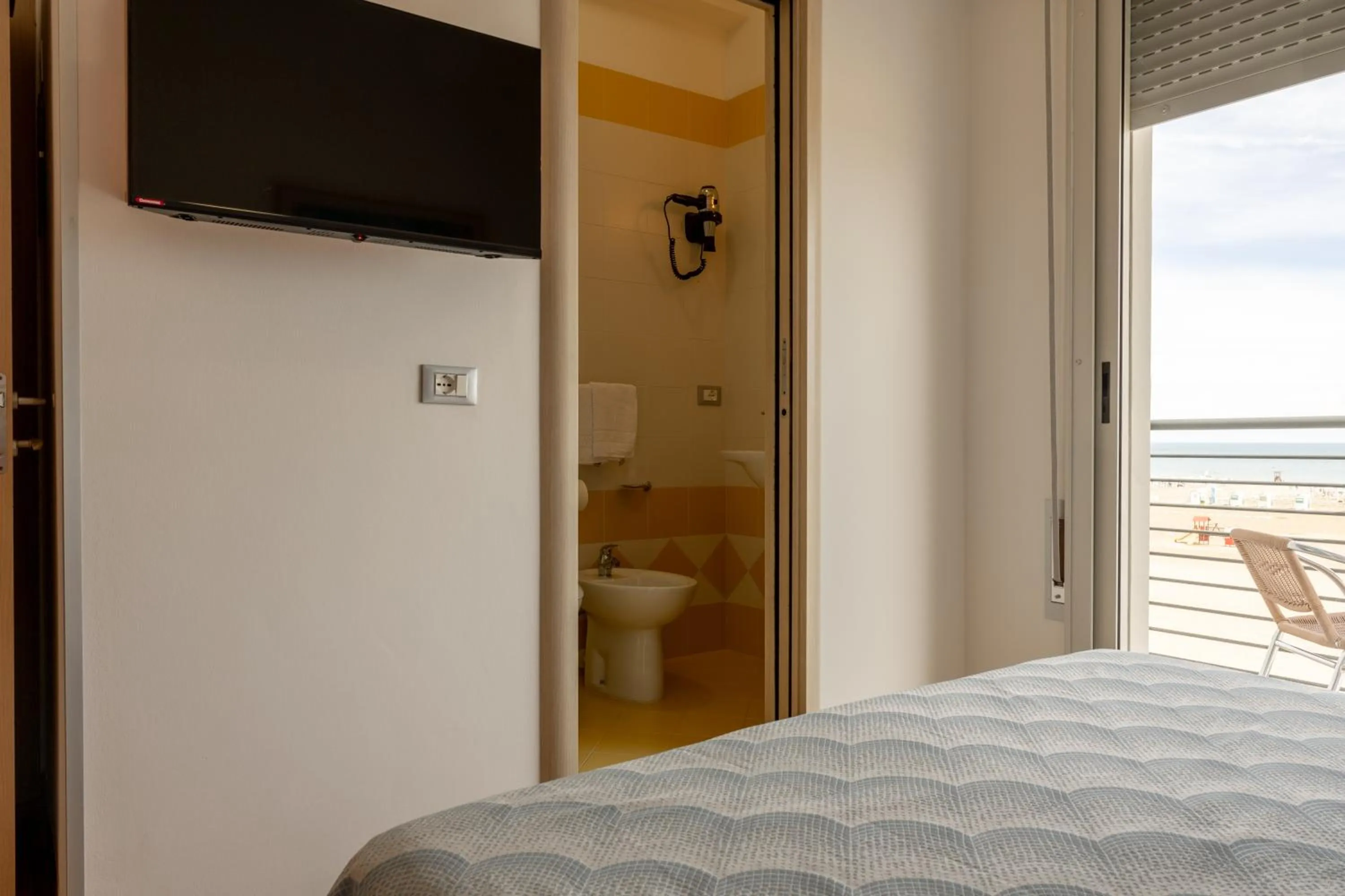 Bed in Hotel Riviera