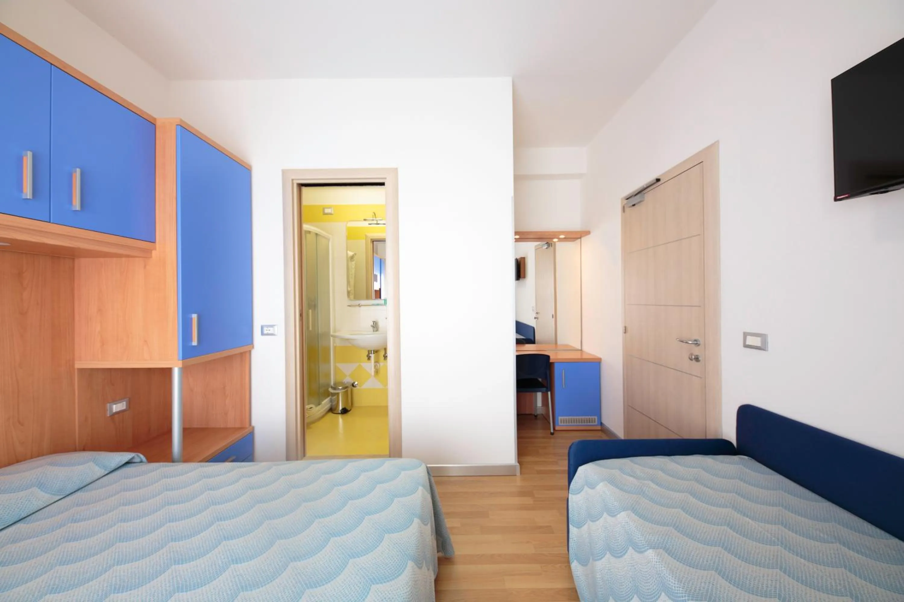 Bed in Hotel Riviera