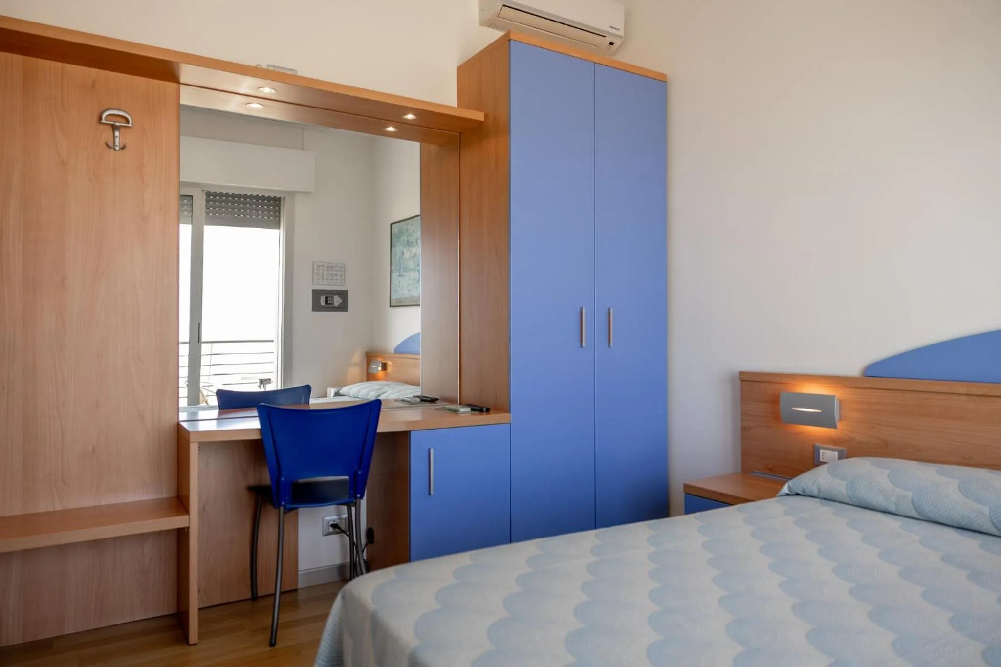 Bed in Hotel Riviera