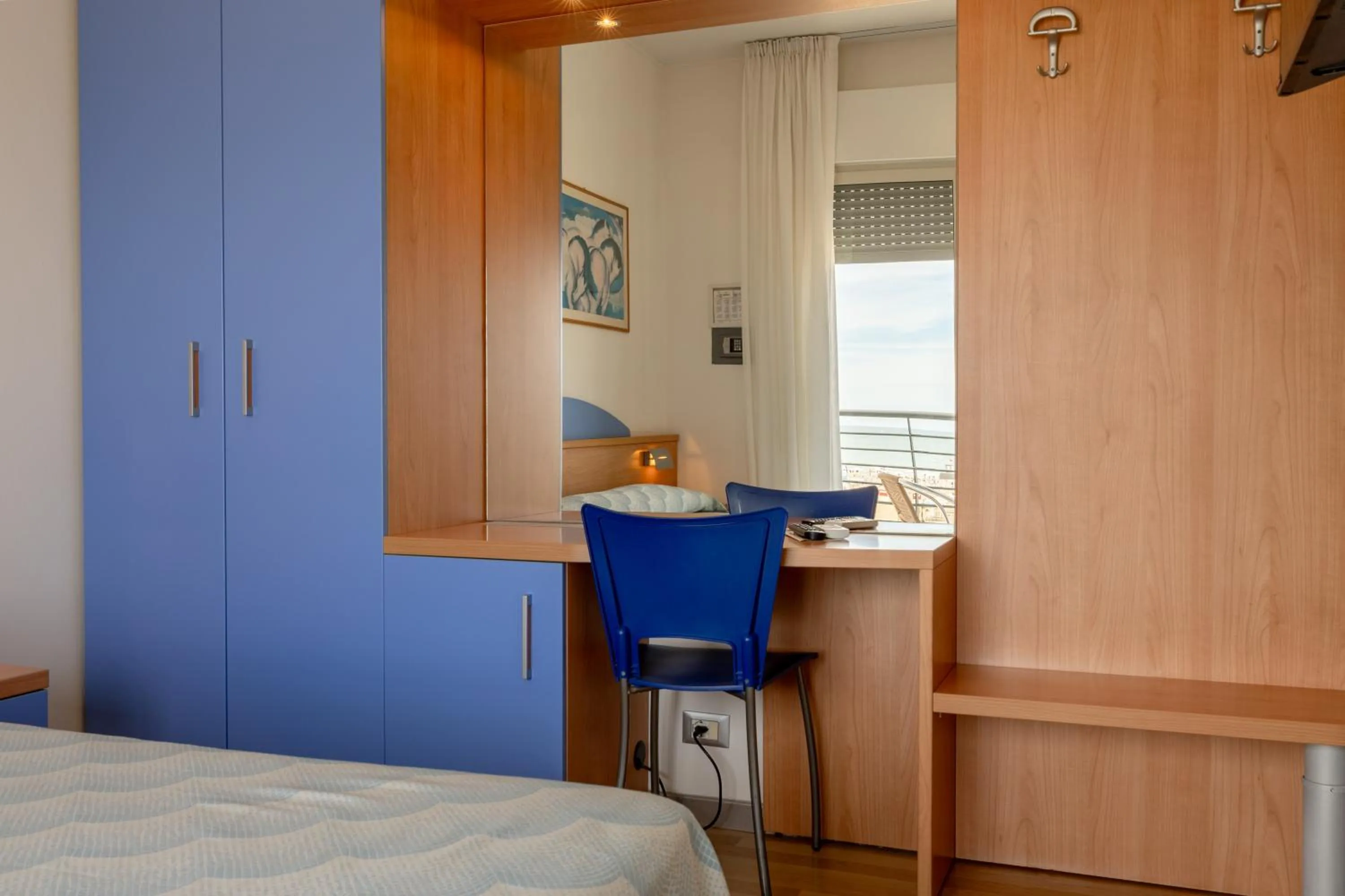 Bed in Hotel Riviera