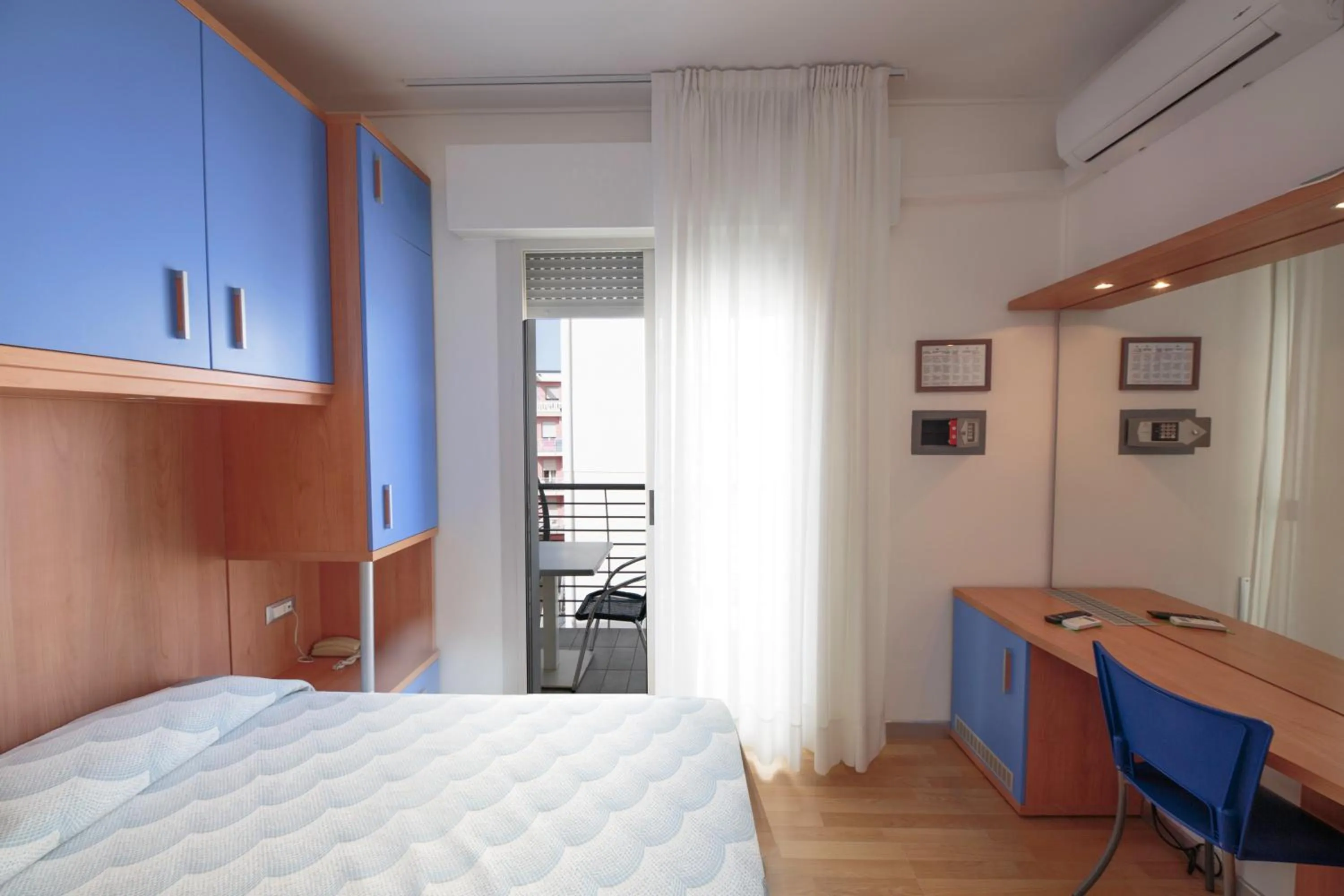 Bed in Hotel Riviera