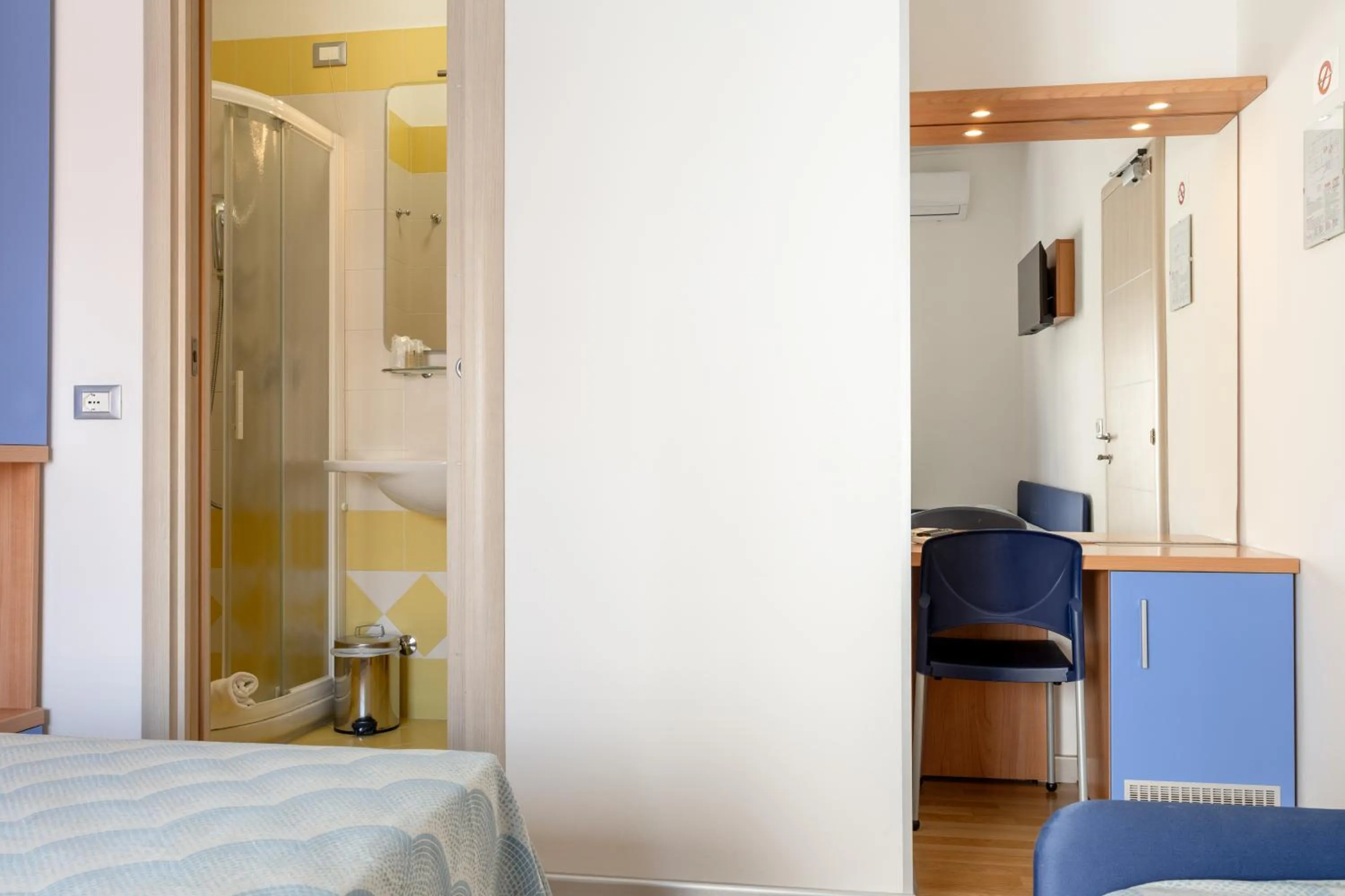 Bed in Hotel Riviera