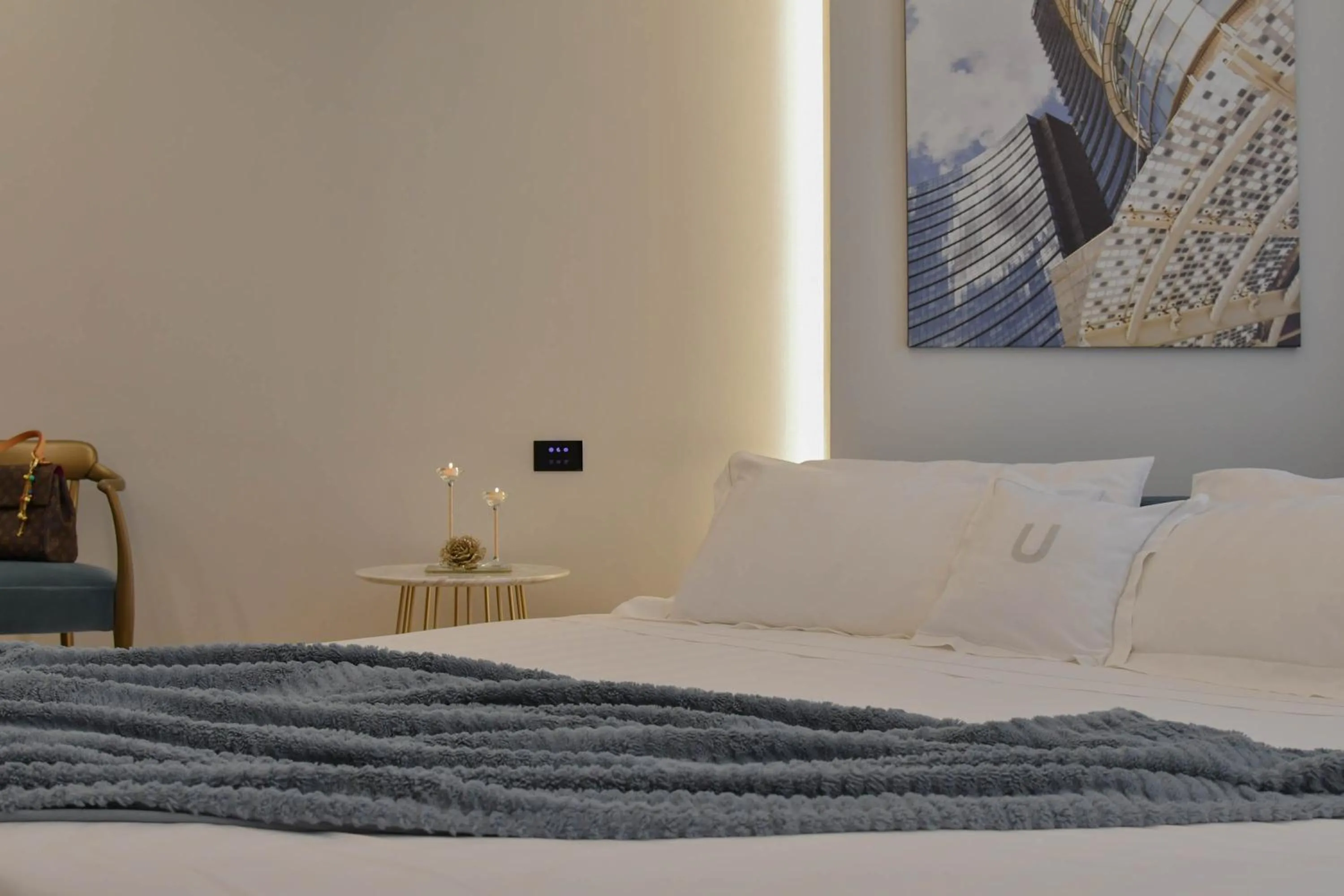 Bed in The Unique Brera Suites