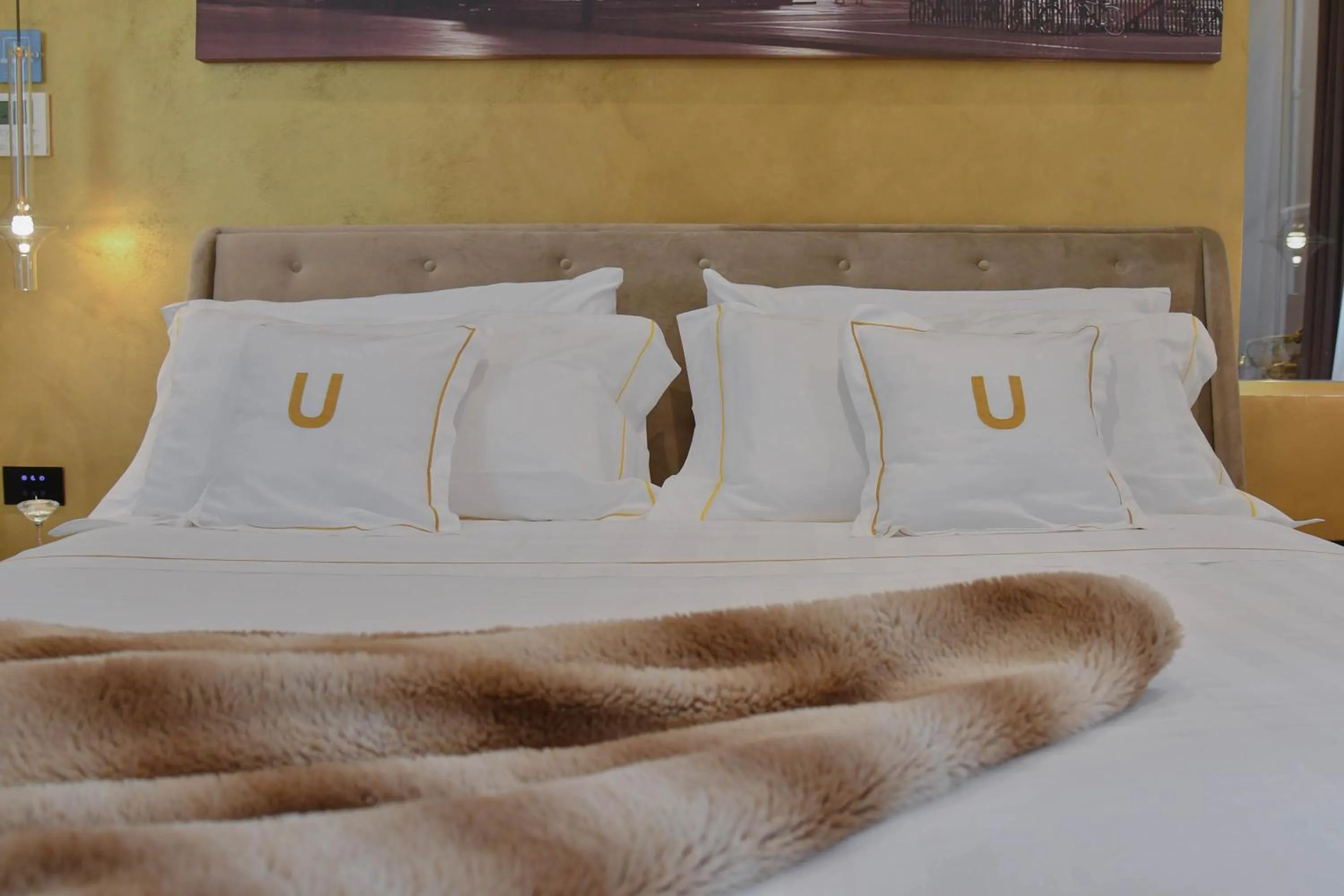 Bed in The Unique Brera Suites