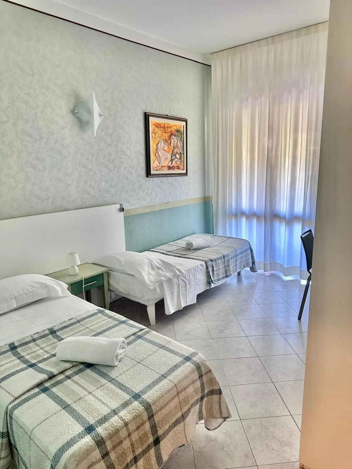 Bed in Hotel Residence Mondial