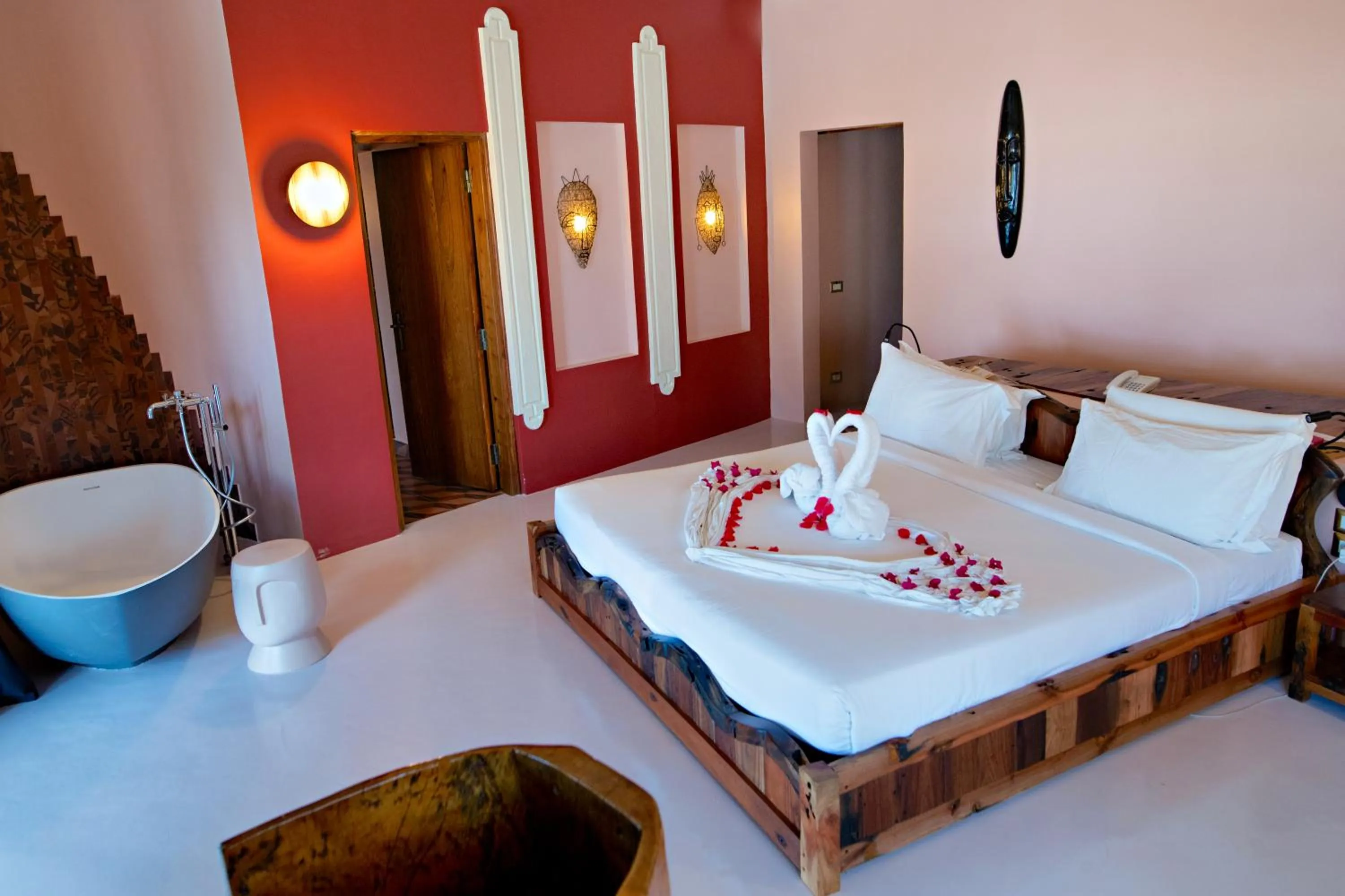 Bed in Gold Zanzibar Beach House & Spa