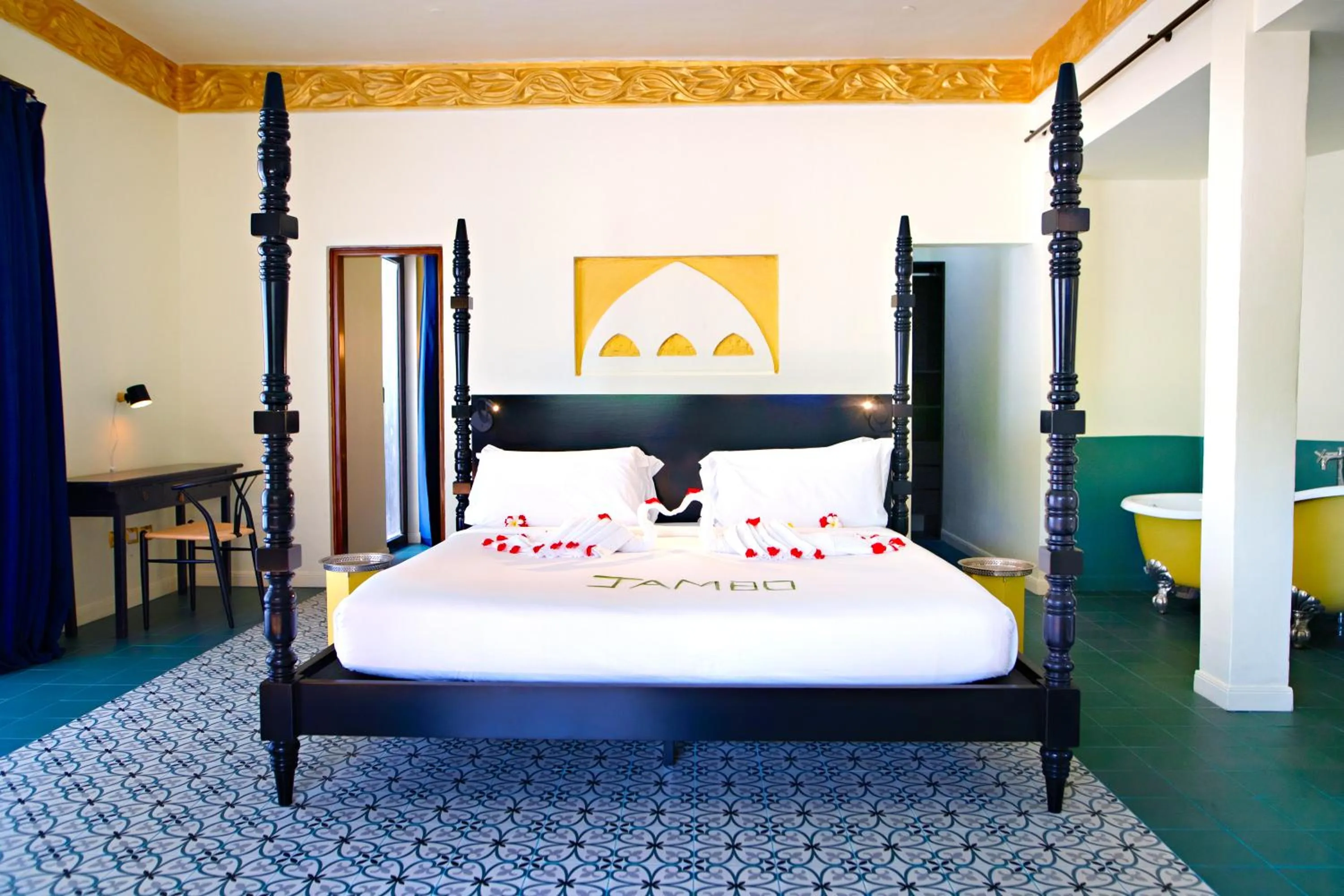 Bed in Gold Zanzibar Beach House & Spa