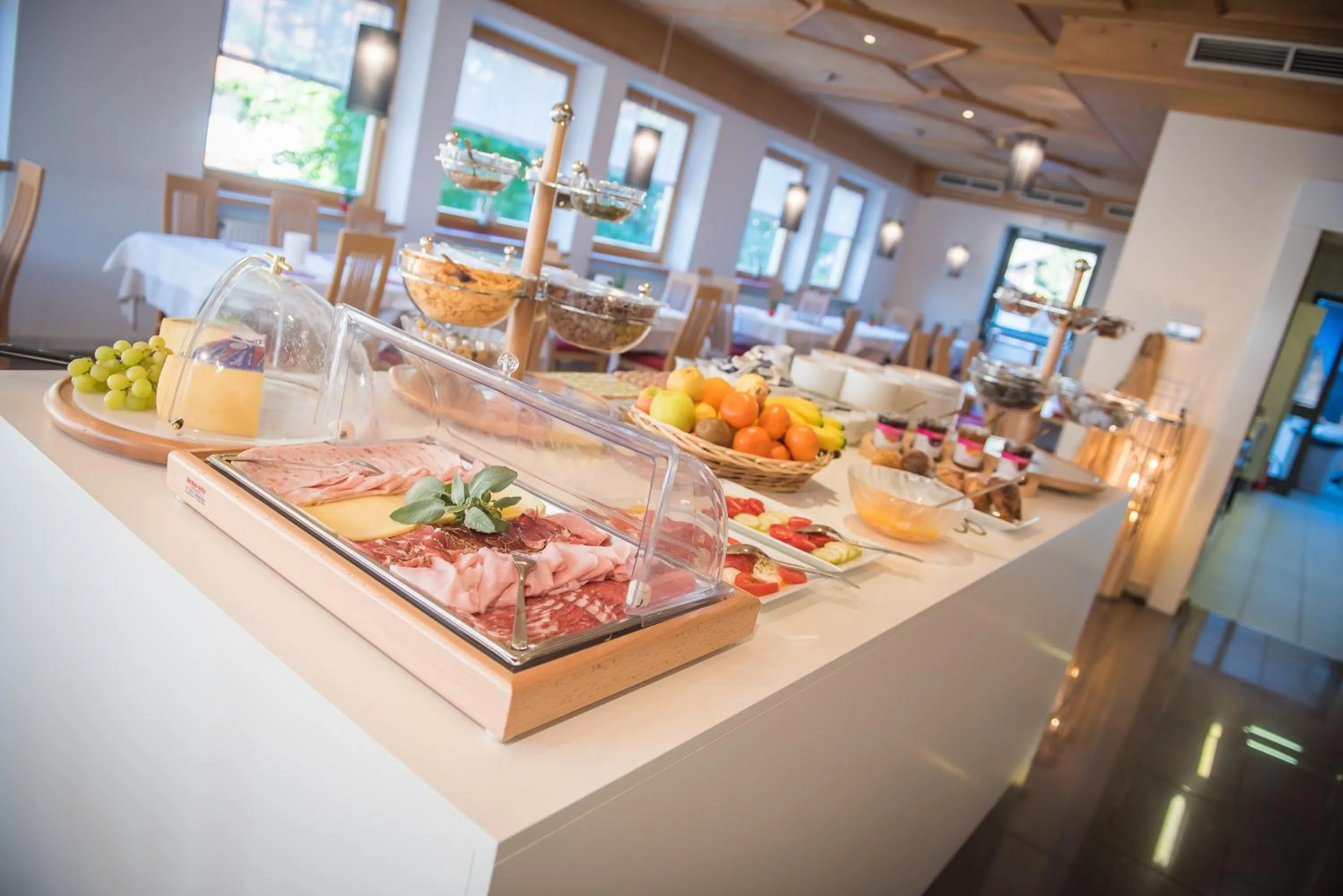 Italian breakfast in Mountain Living Apartments