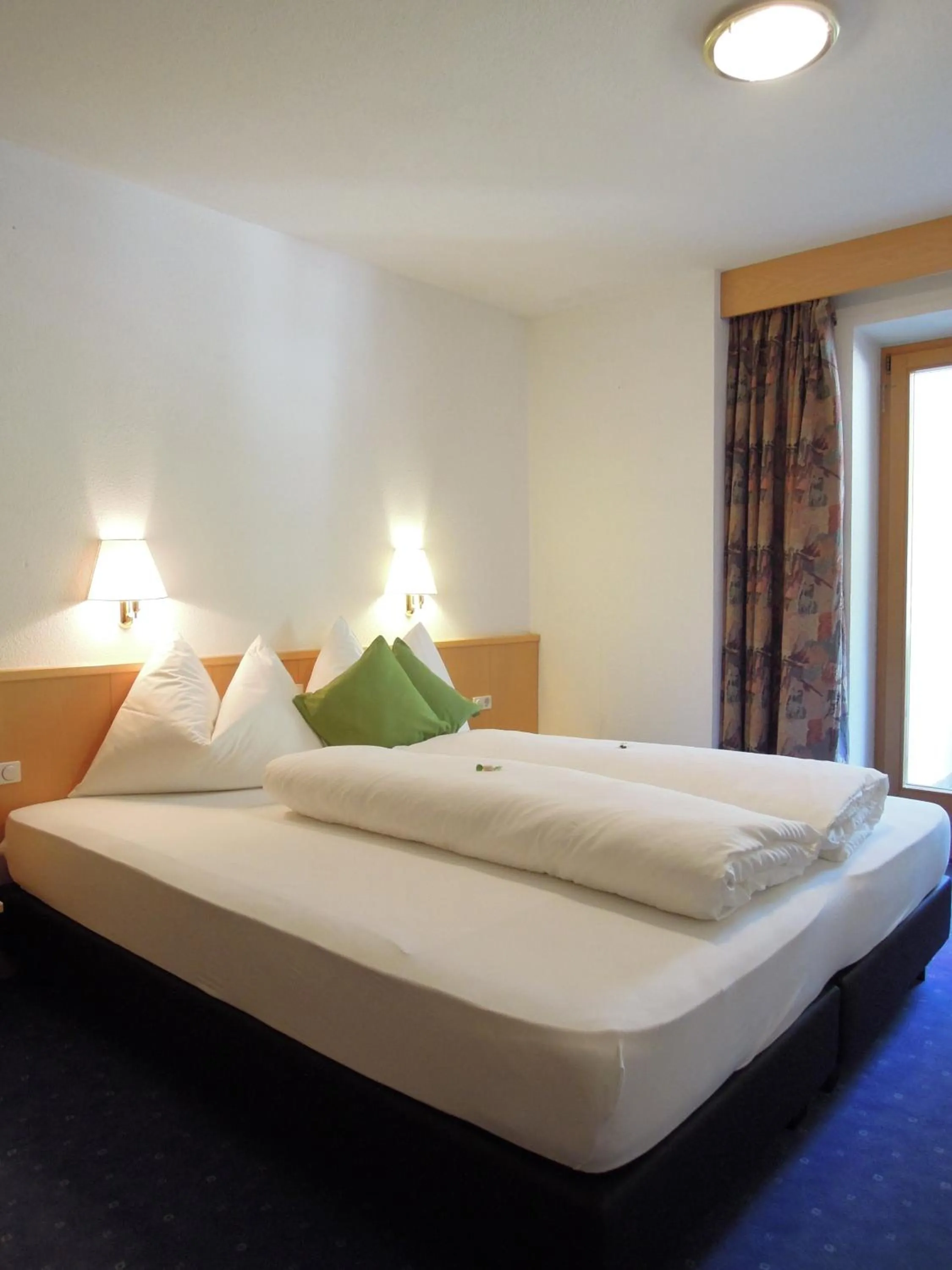 Bedroom, Bed in Mountain Living Apartments