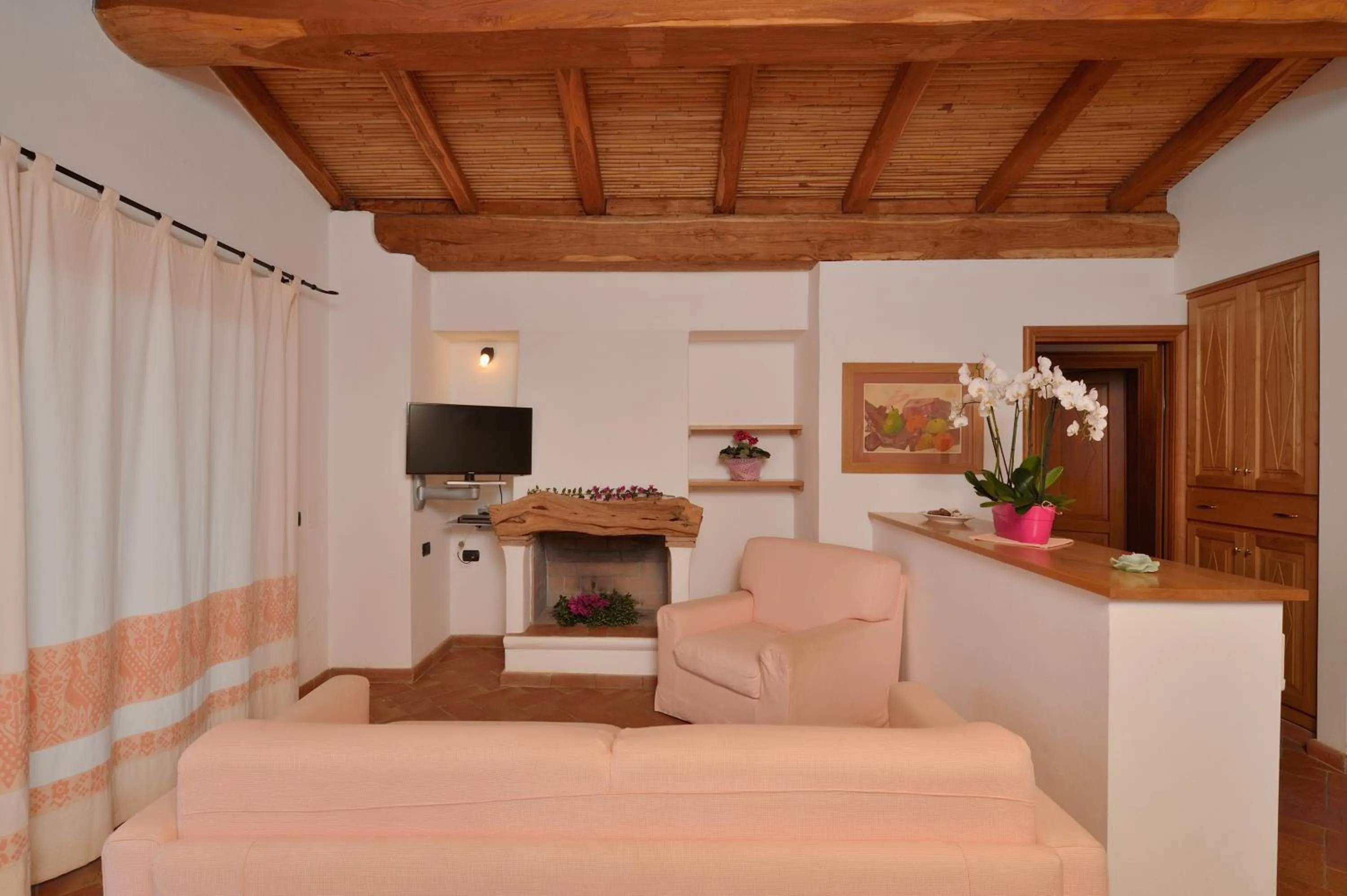 Living room, Bed in Villa Isuledda Beach