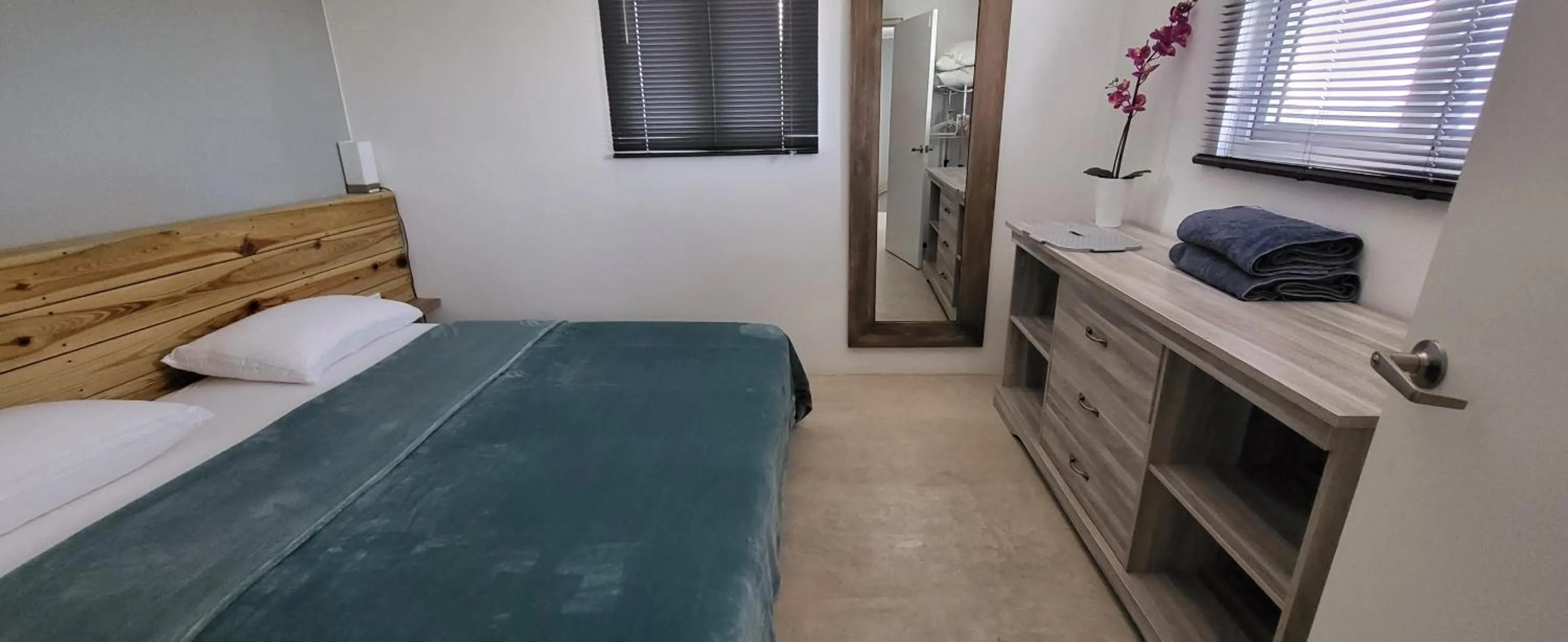 Bed in Sunny Hill Apartment