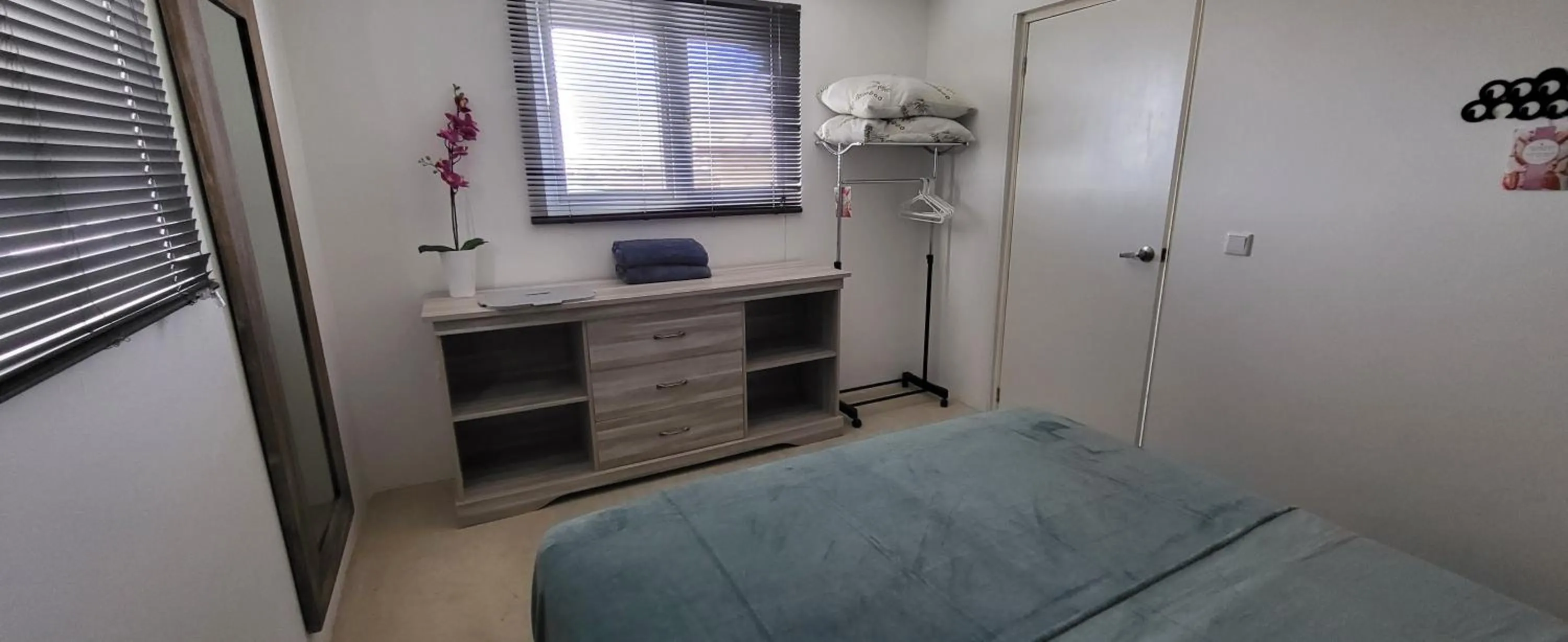 Bed in Sunny Hill Apartment