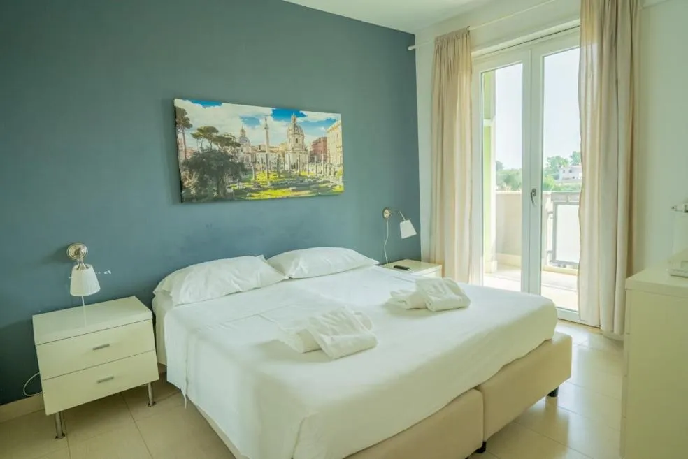 Bed in Isa Residence Fiumicino Airport