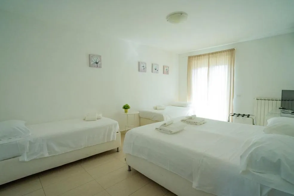Bed in Isa Residence Fiumicino Airport