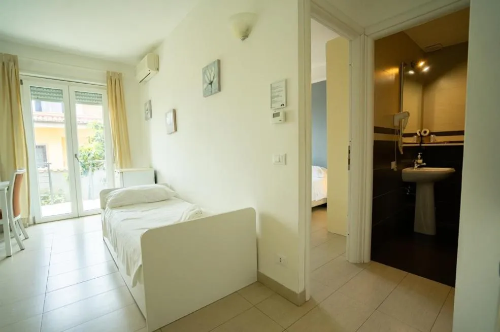 Bed in Isa Residence Fiumicino Airport