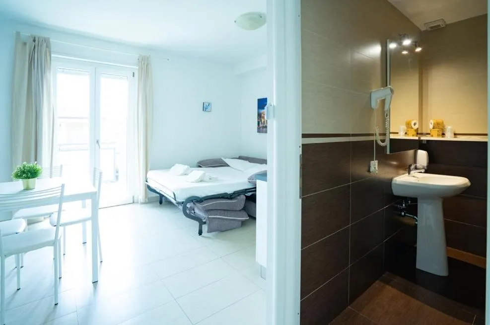 Bed in Isa Residence Fiumicino Airport