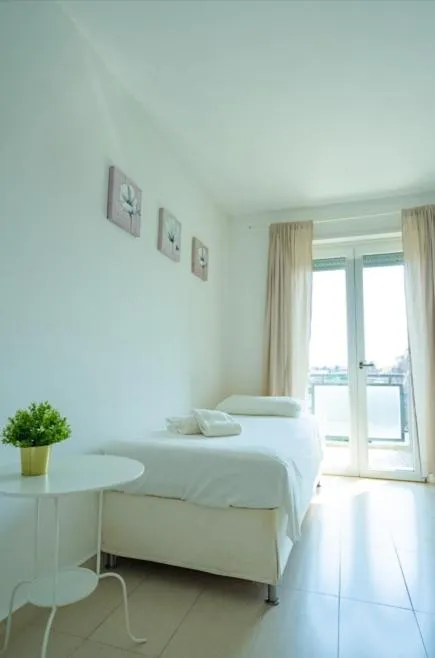 Bed in Isa Residence Fiumicino Airport