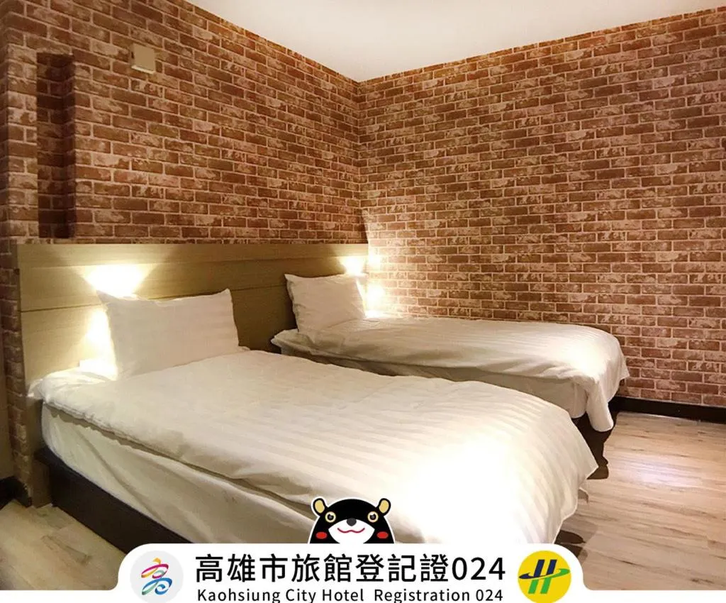 Bed in Win Inn Kaohsiung Hotel