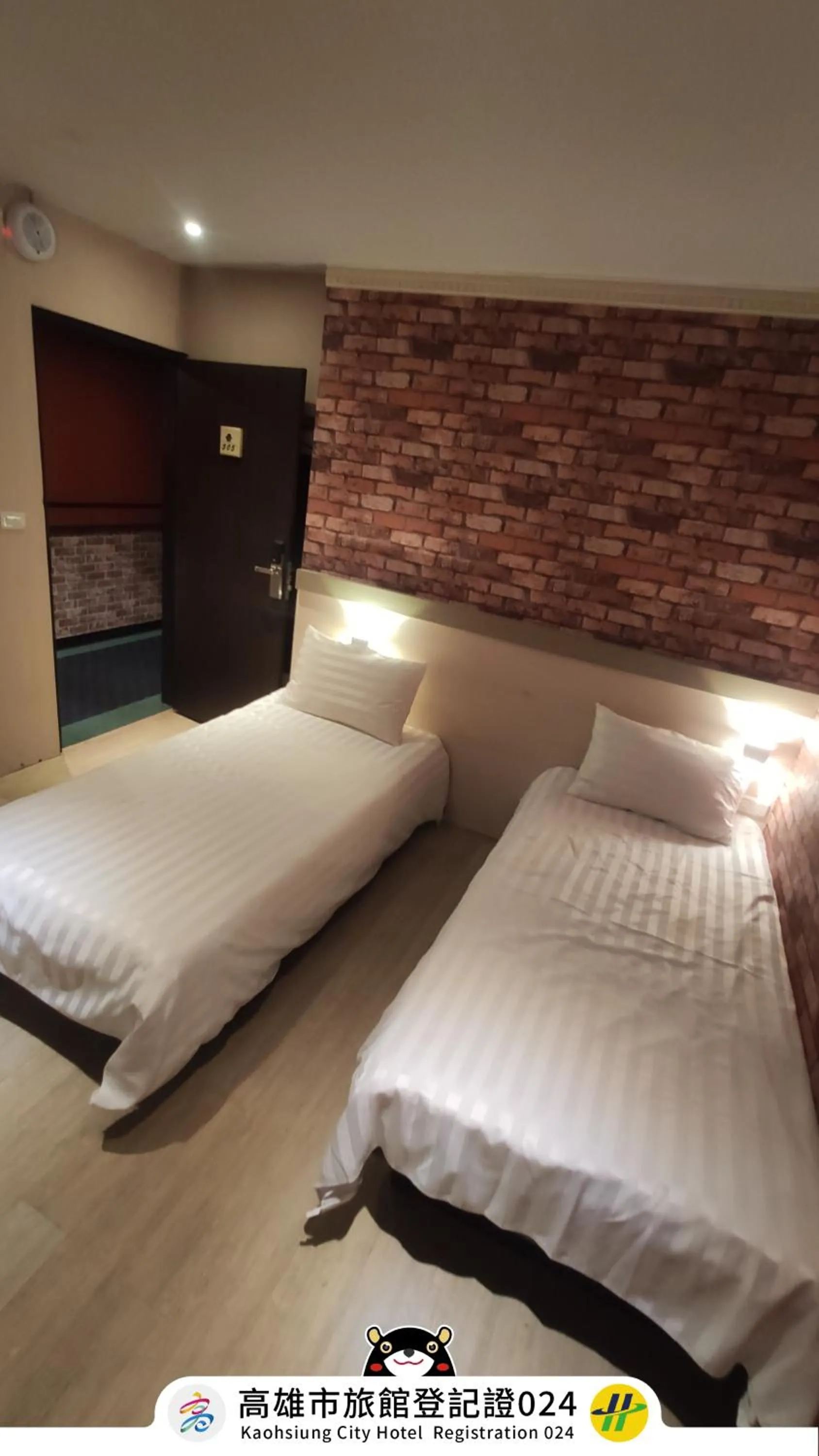 Bed in Win Inn Kaohsiung Hotel