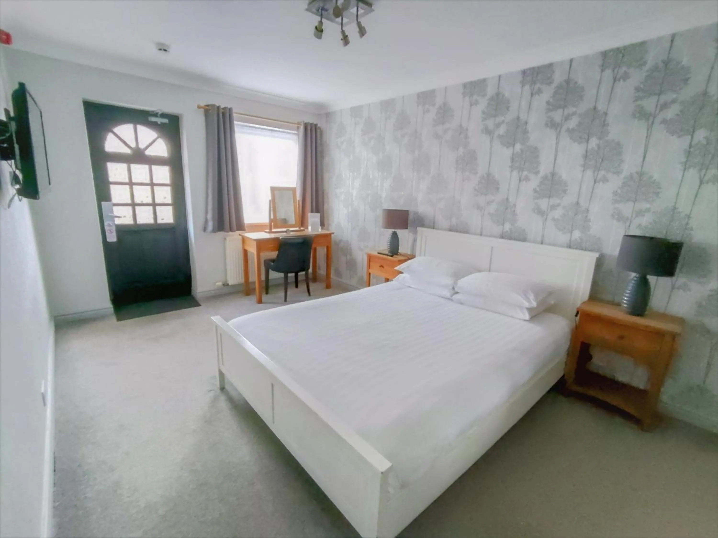 Bed in Woodcote Hotel