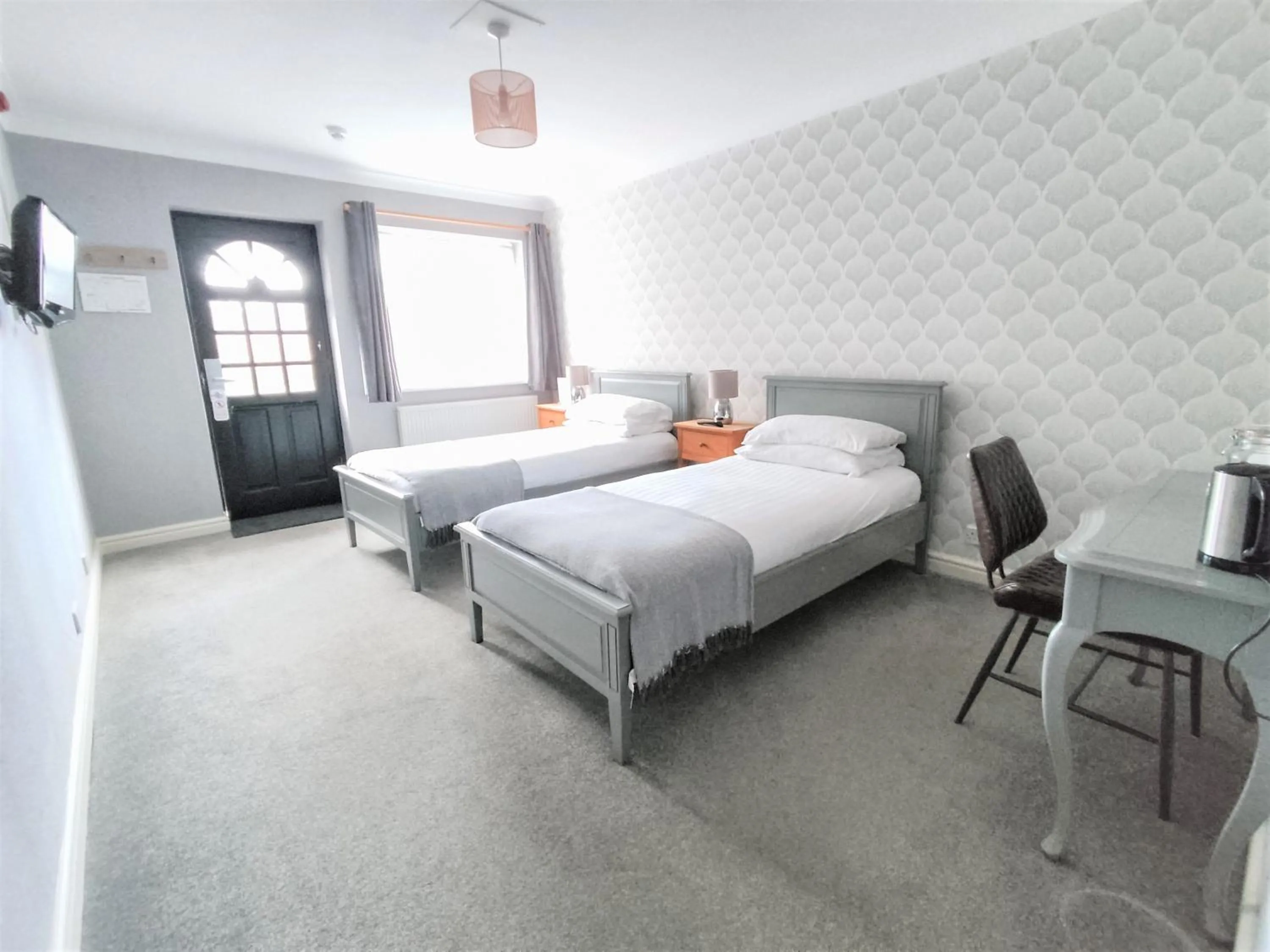 Bed in Woodcote Hotel