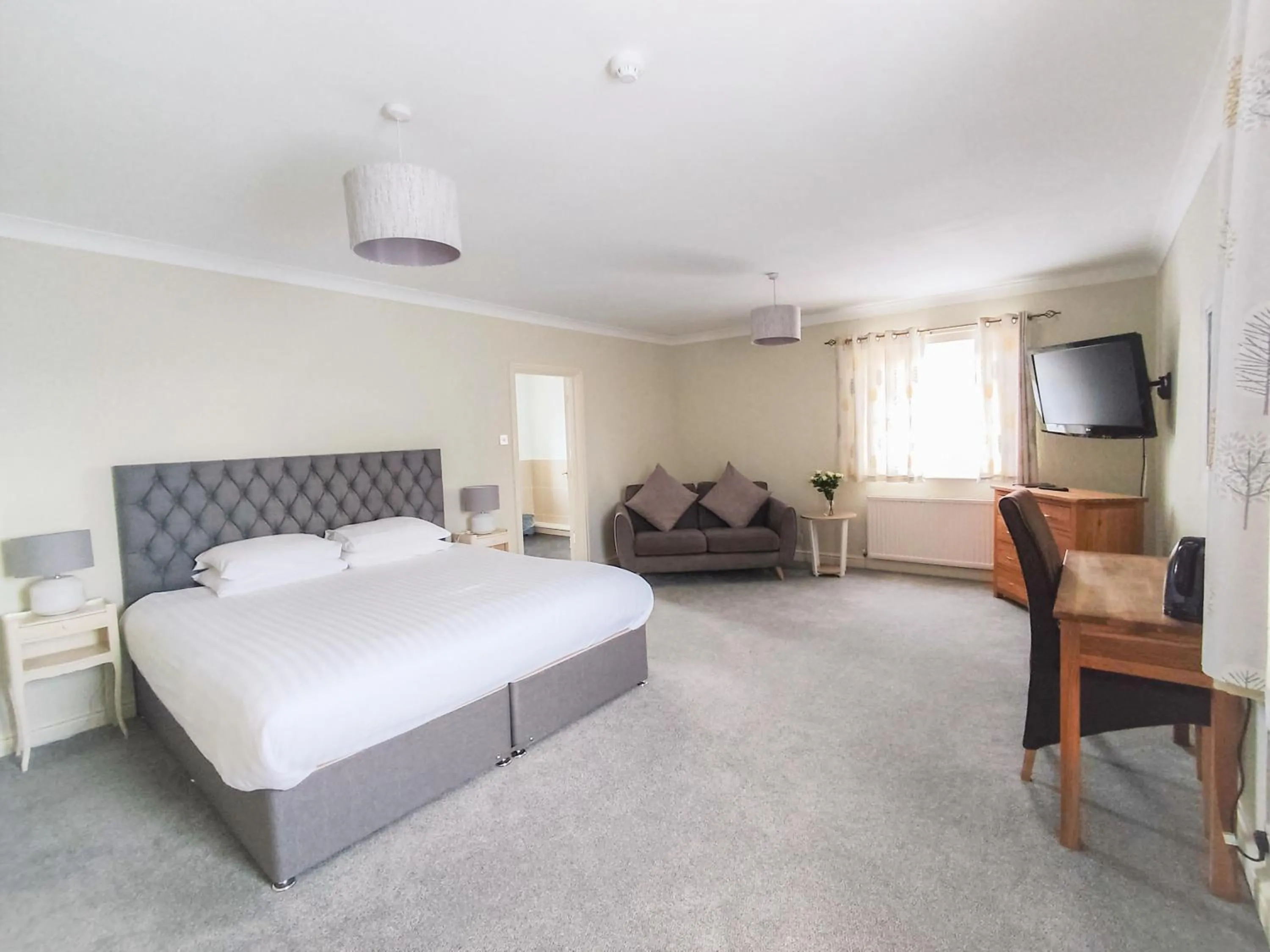 Bed in Woodcote Hotel