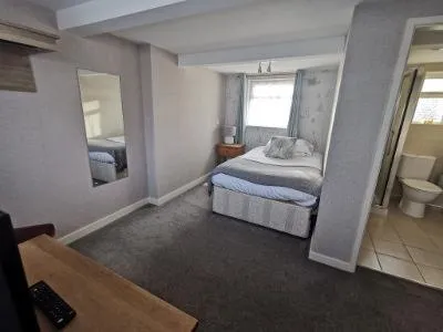 Bed in Woodcote Hotel