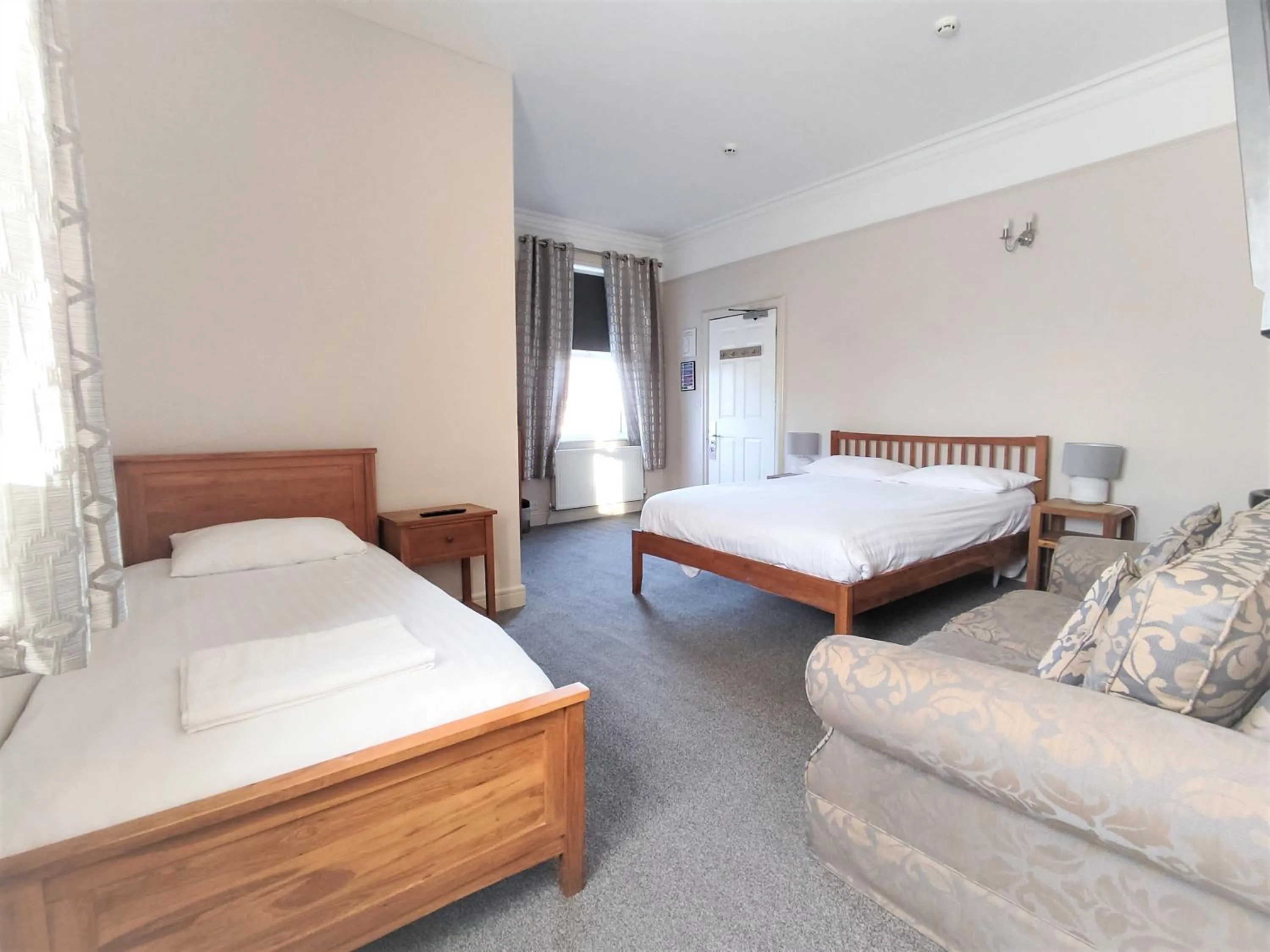 Bed in Woodcote Hotel