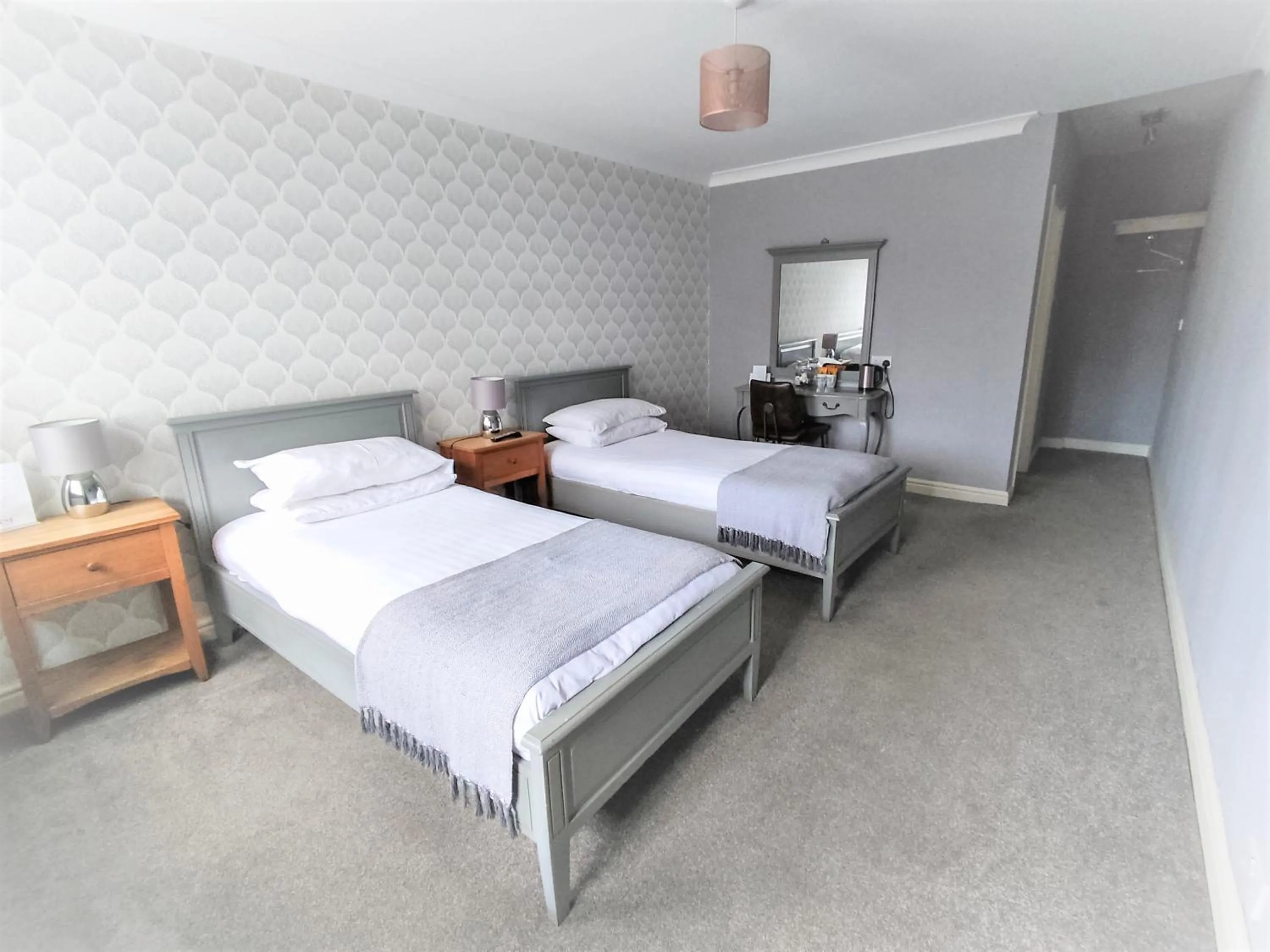 Bed in Woodcote Hotel