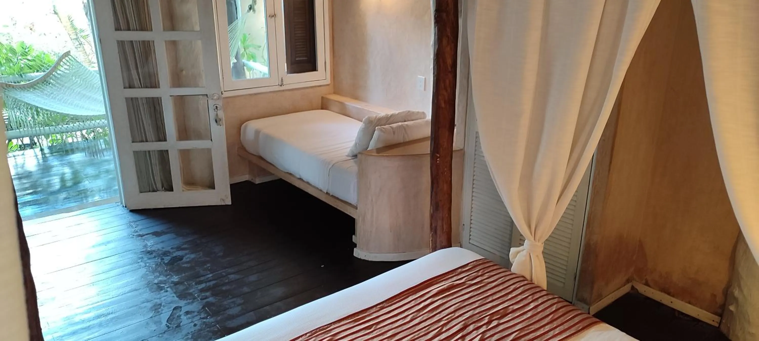 Bed in Villa Las Estrellas Tulum - located at the party zone
