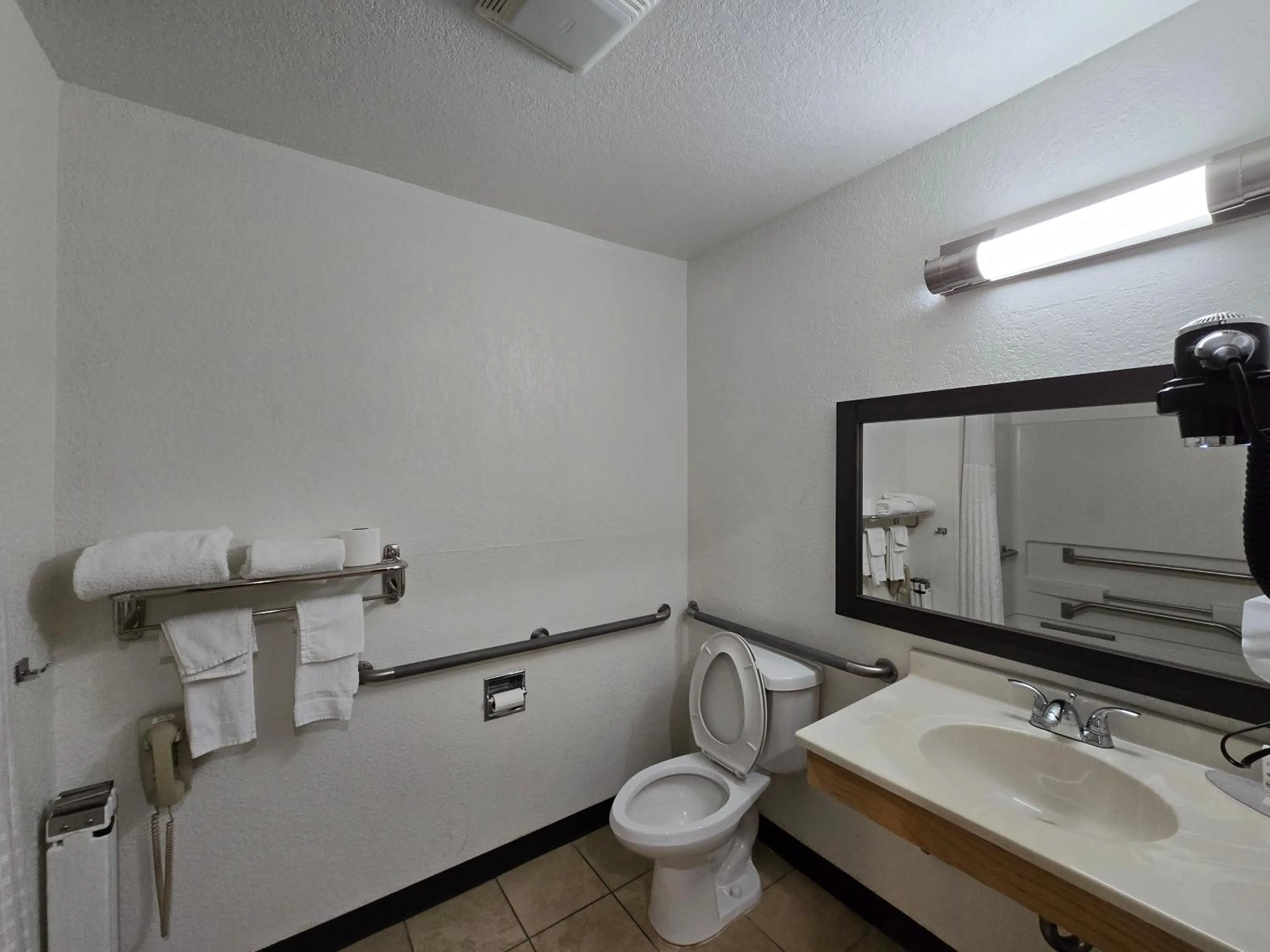 Toilet in Super 8 by Wyndham Johnstown