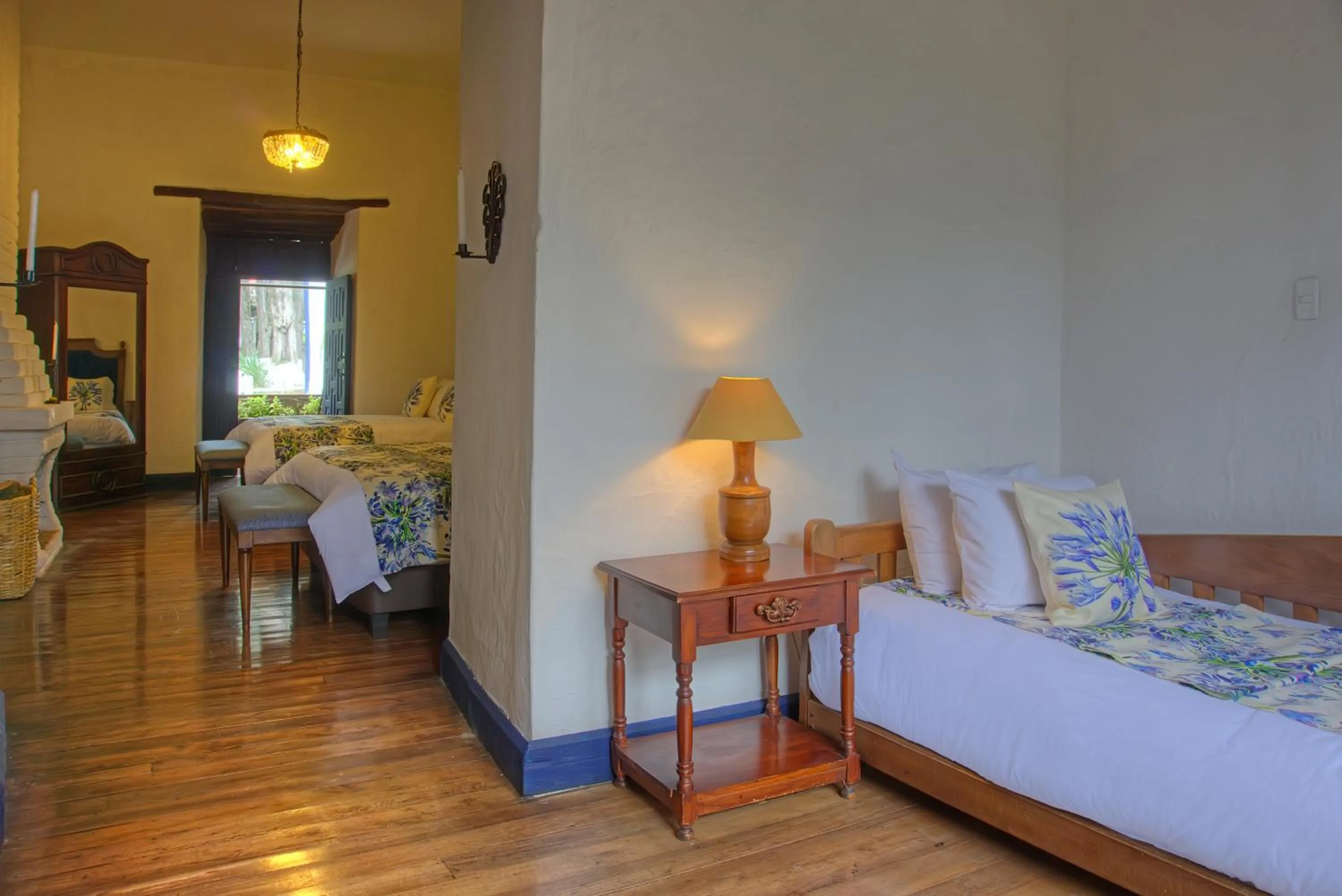 Bed in Hostería Hacienda Pinsaqui