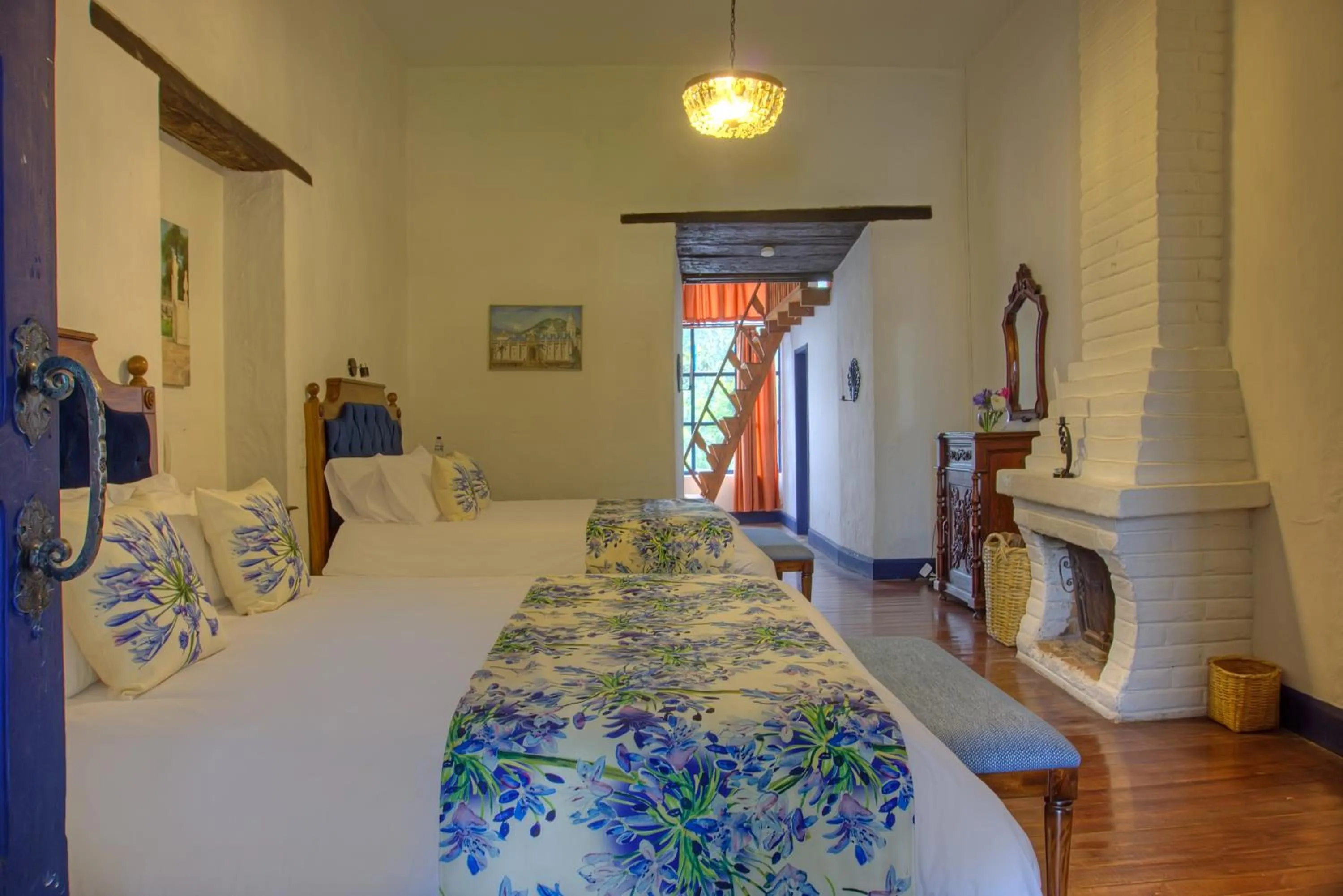 Bed in Hostería Hacienda Pinsaqui