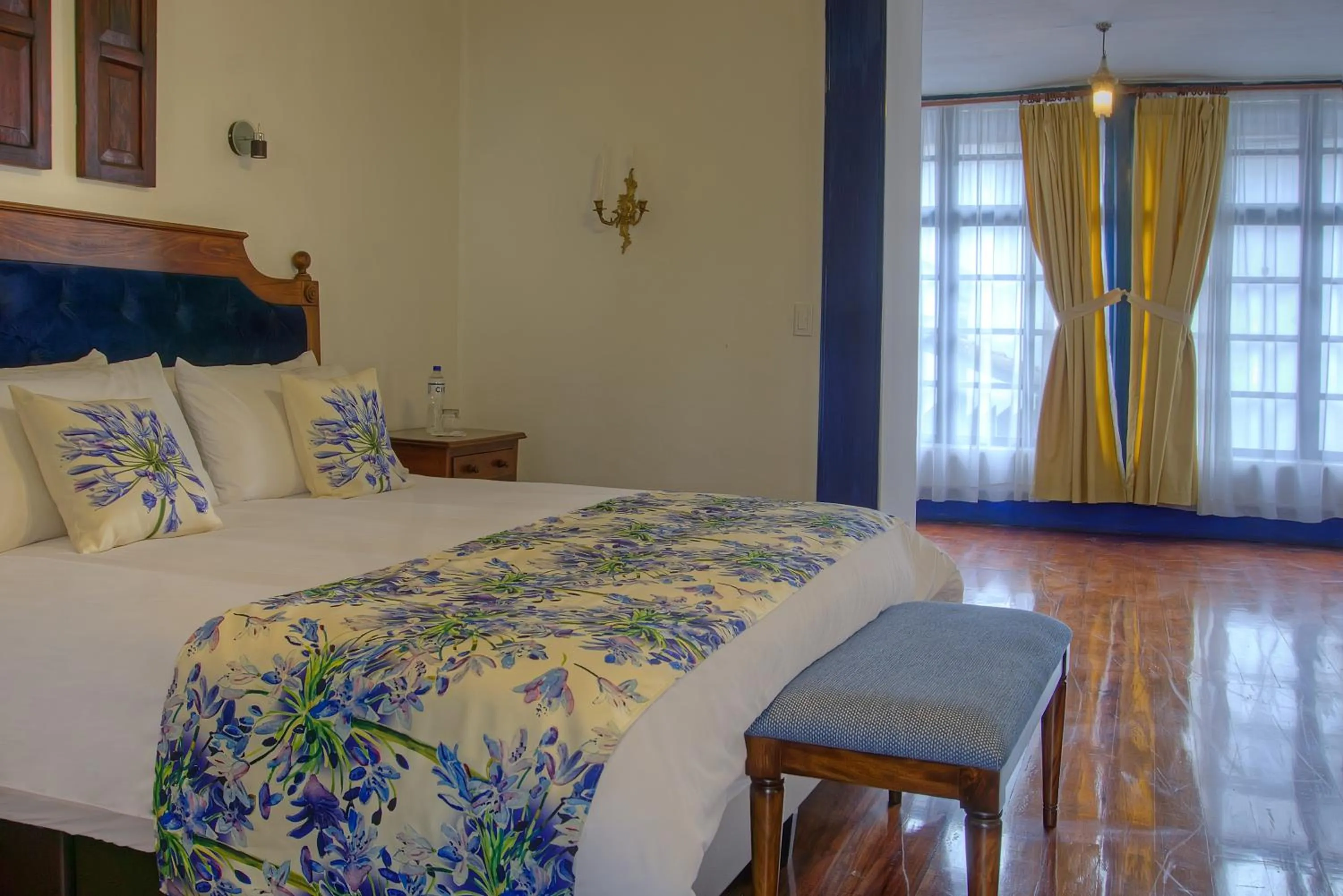 Bed in Hostería Hacienda Pinsaqui