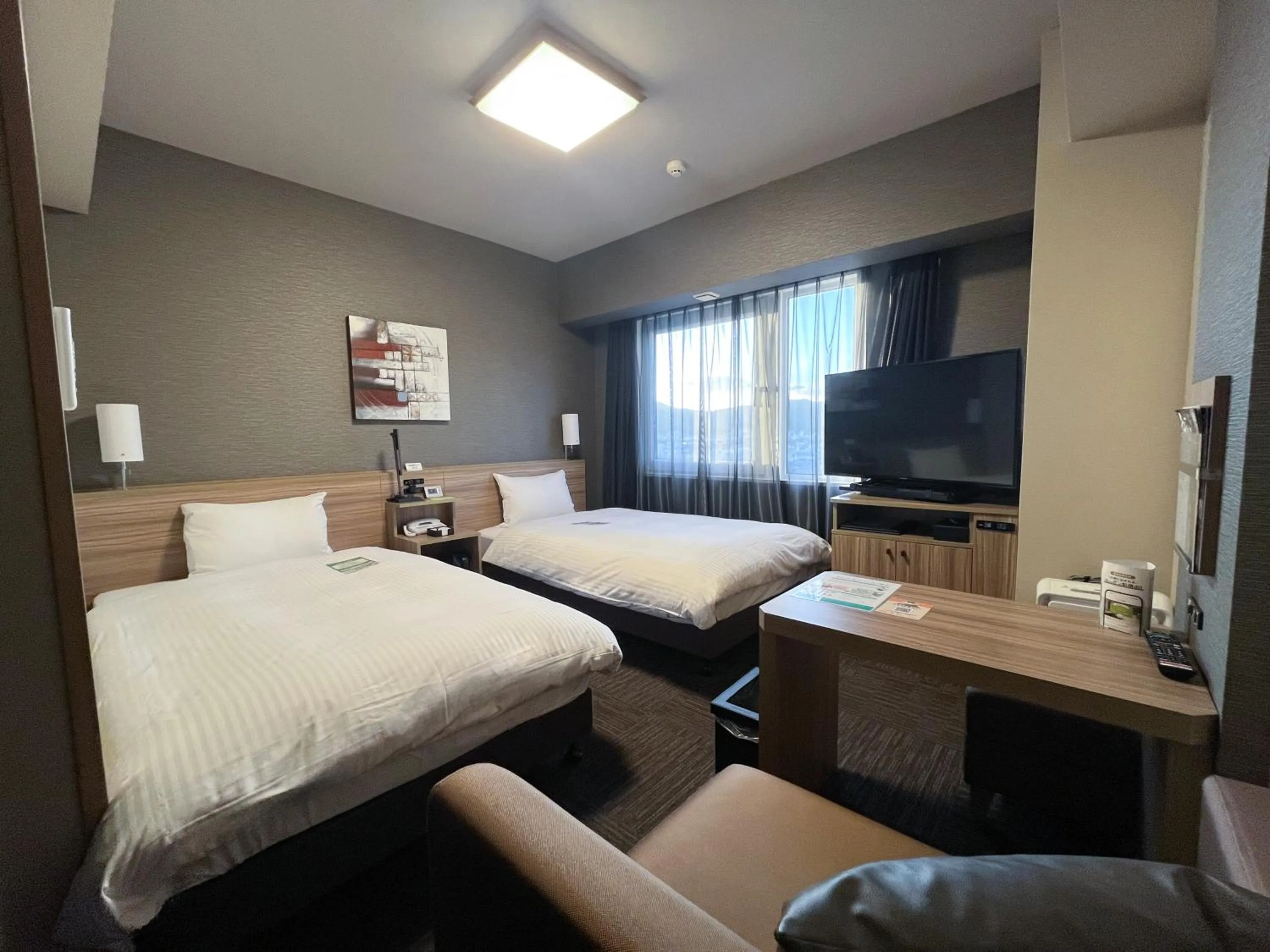 Photo of the whole room, Bed in Hotel Route Inn Kasai Hojonoshuku