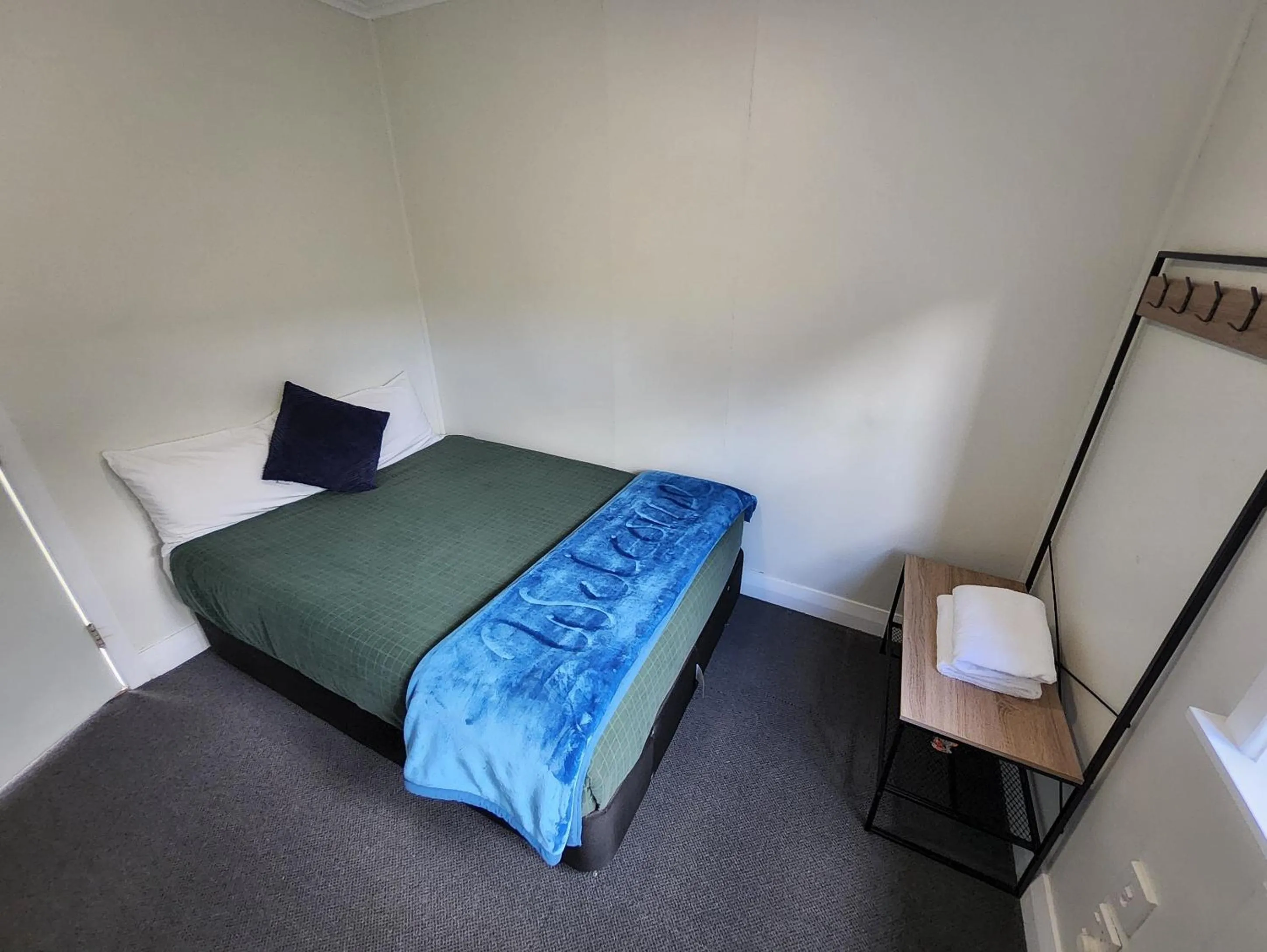 Bed in LKNZ Lodge & Cafe