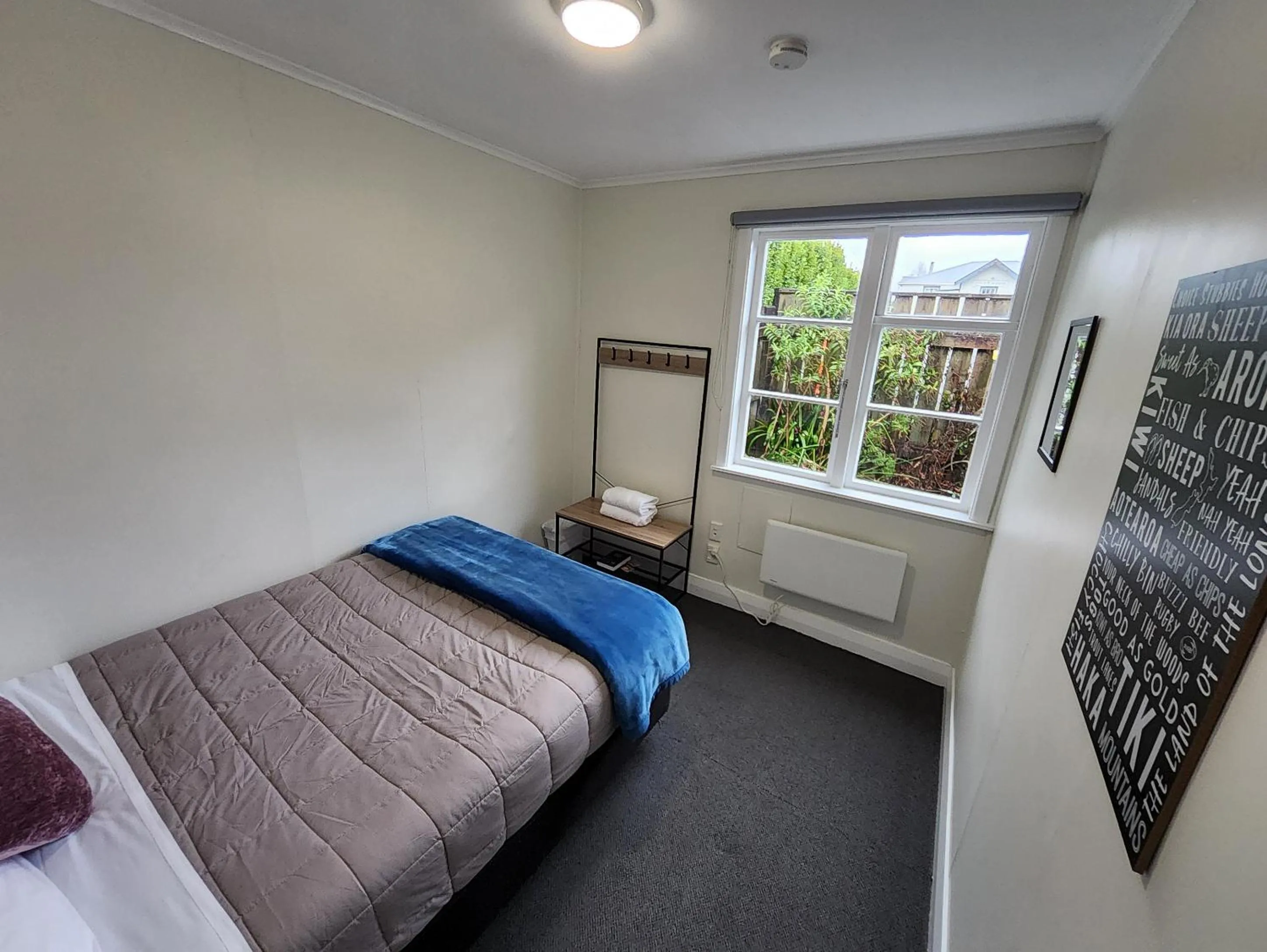 Bed in LKNZ Lodge & Cafe