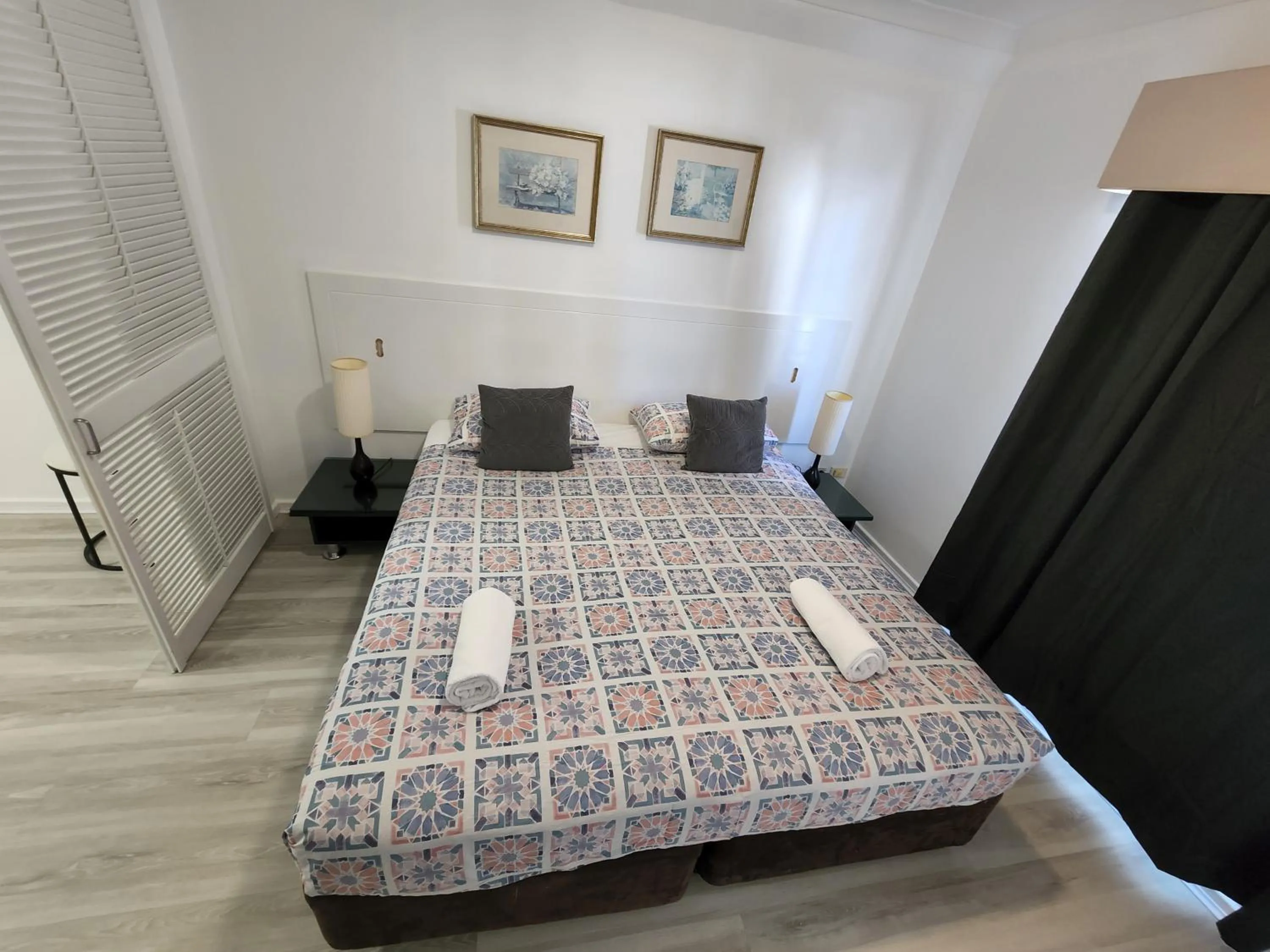 Bed in PERTH CBD APARTMENTS