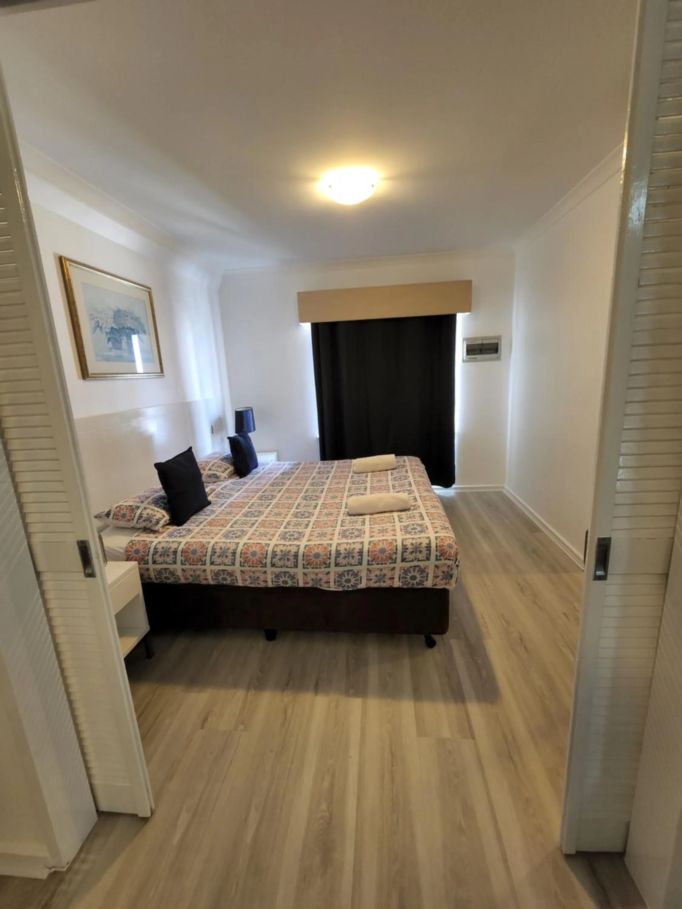 Bed in PERTH CBD APARTMENTS