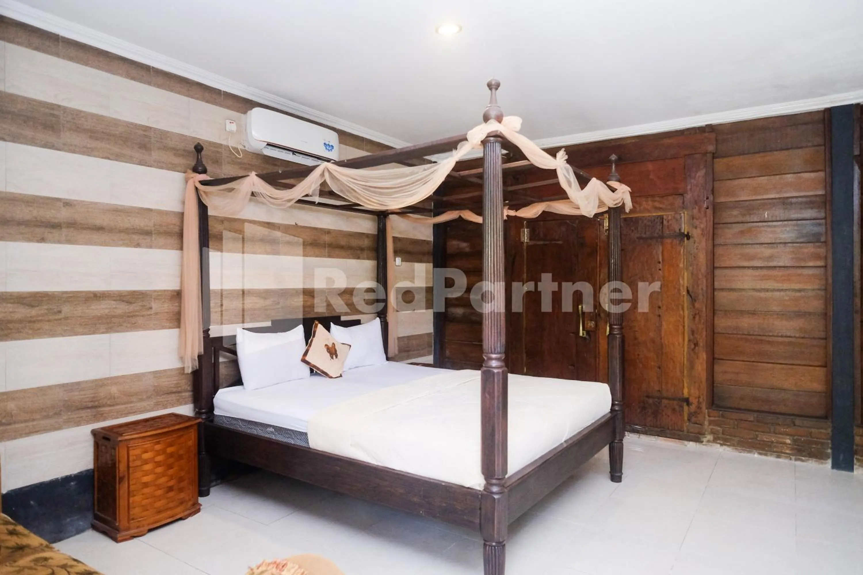 Bed in Kebon Krapyak Cottage Syariah Mitra RedDoorz near Stadion Maguwoharjo