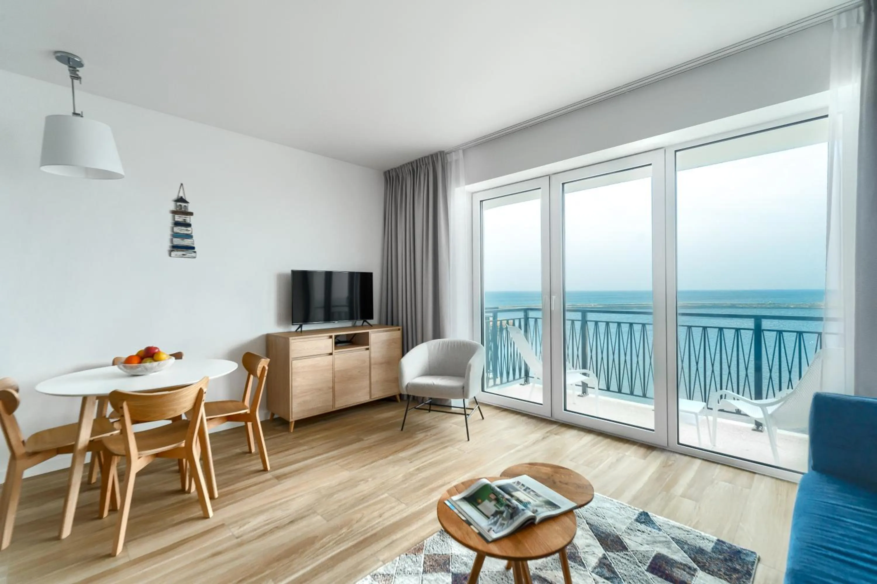 Seating area, Bed in Apartamenty Marina z widokiem na morze