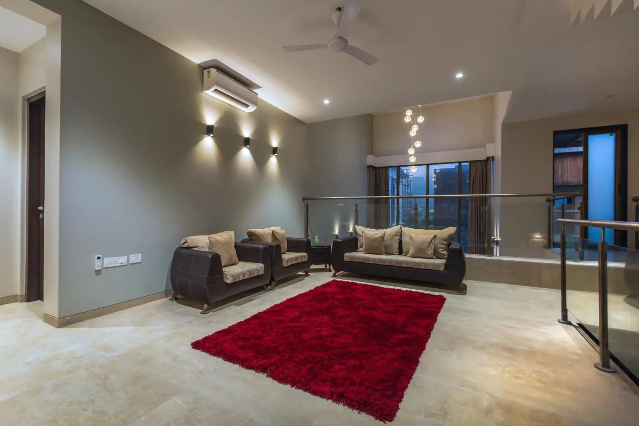 Living room in SaffronStays Aspen, Lonavala - luxury pool villa with games and TV room near Bhushi Dam