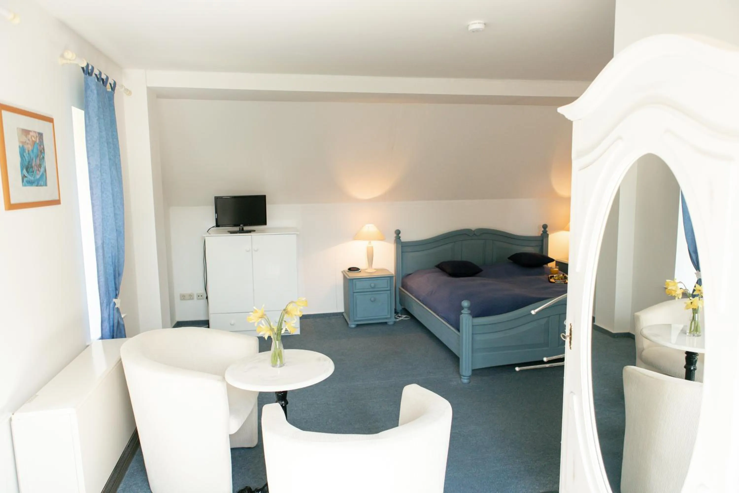 Bed in Boutiquehotel Gut Tribbevitz auf Rügen