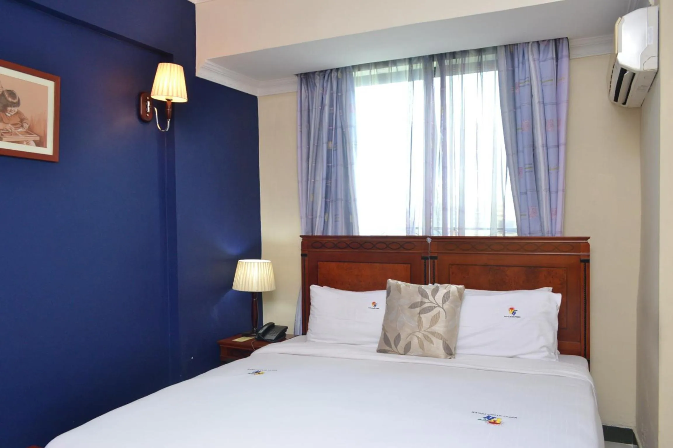 Bed in Hotel Nikko Towers